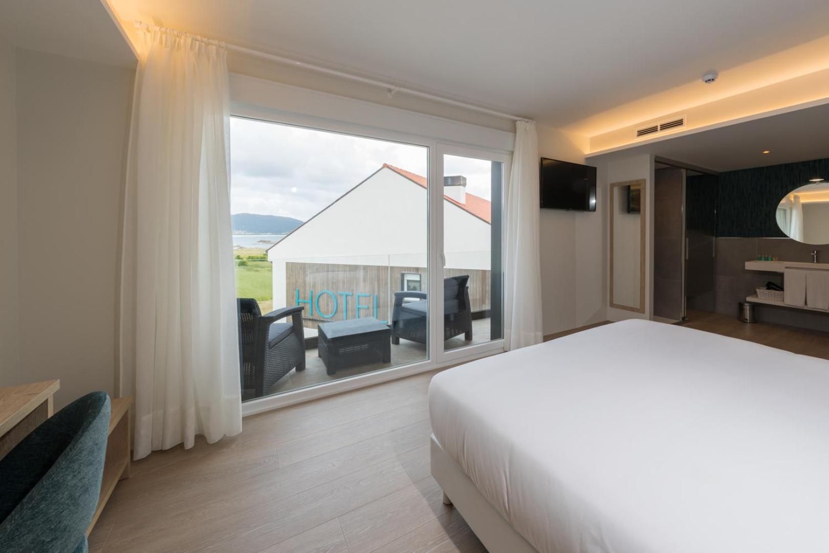 Habitación Doble Deluxe con Balcón y Vista al Mar