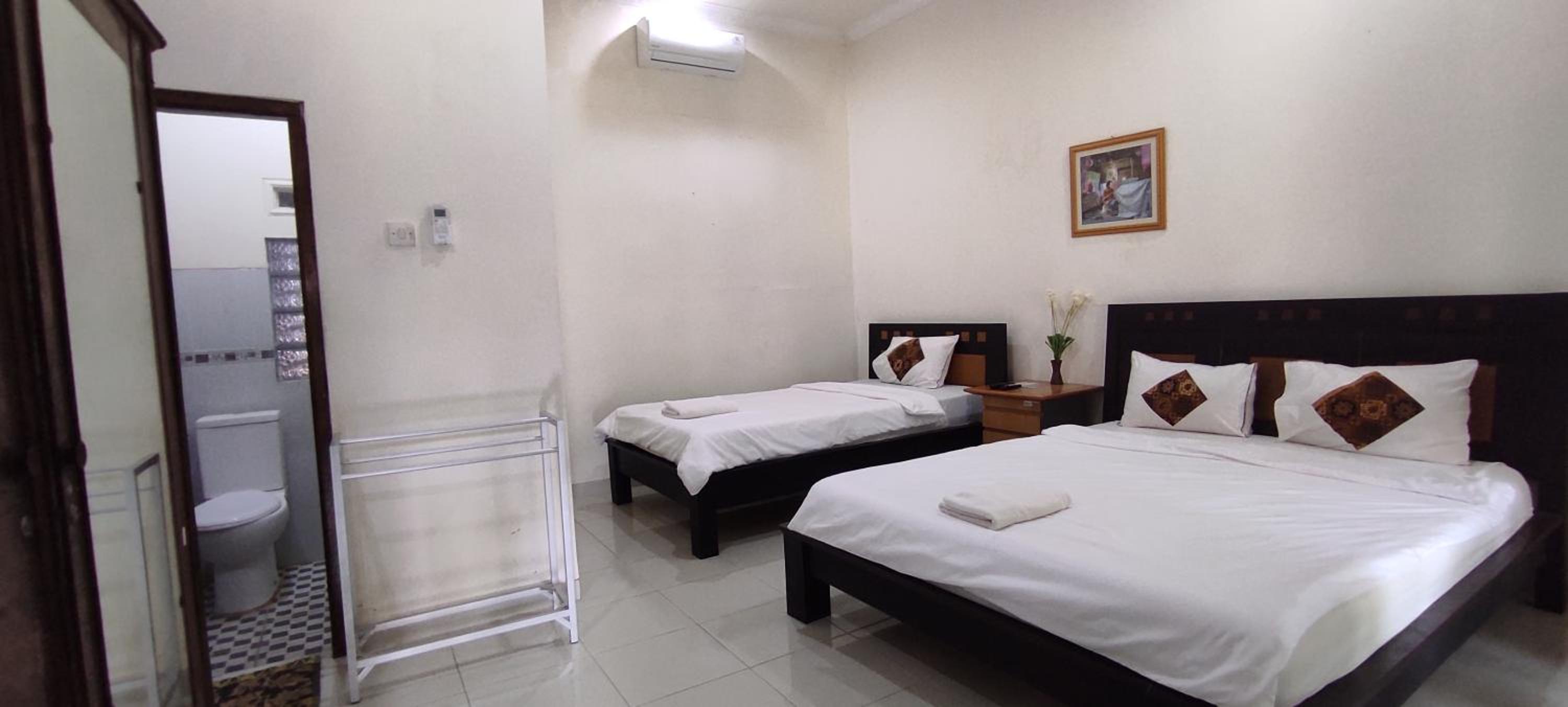 Triple Room - Photo 1