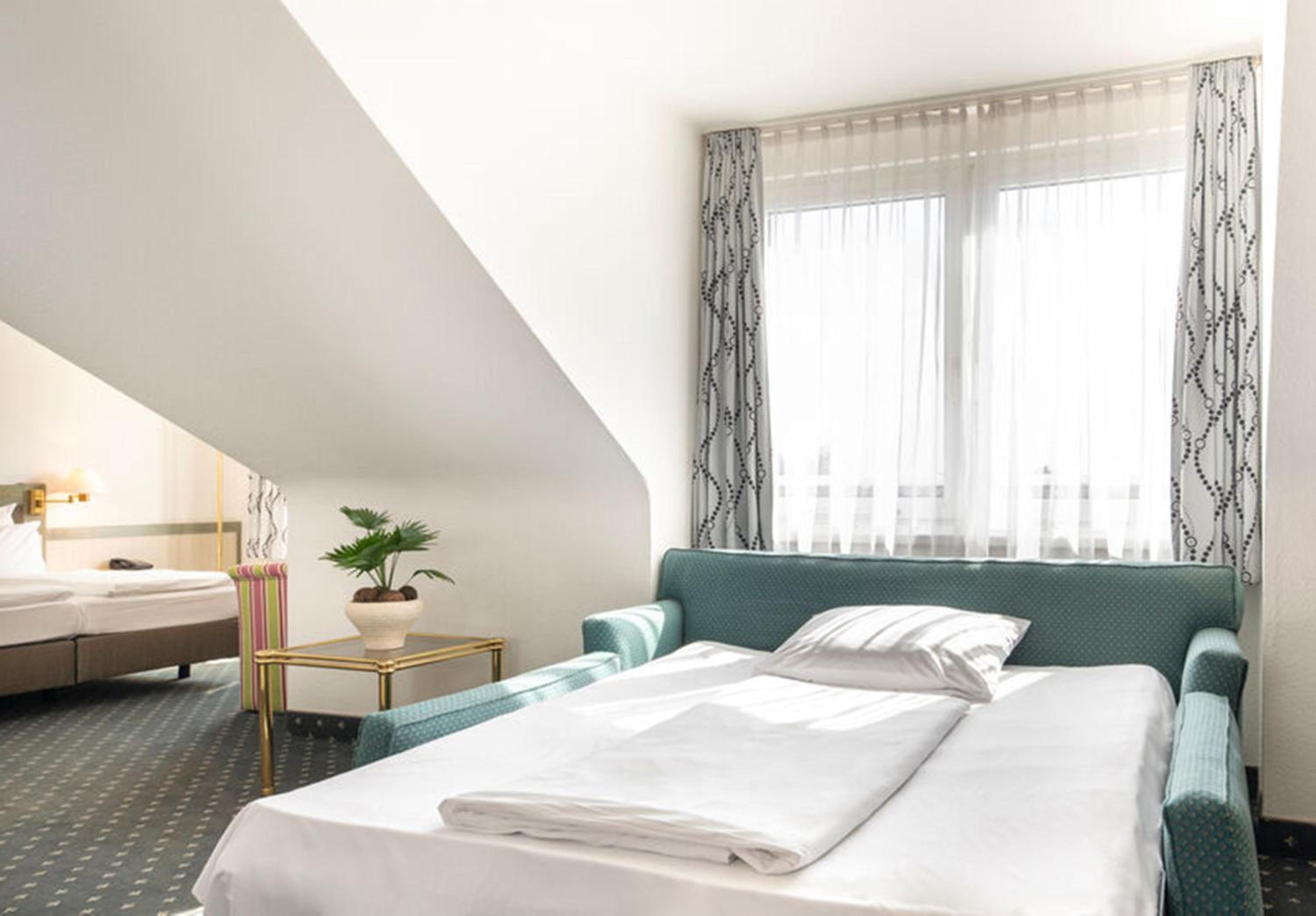 Business Triple Room - Photo 1