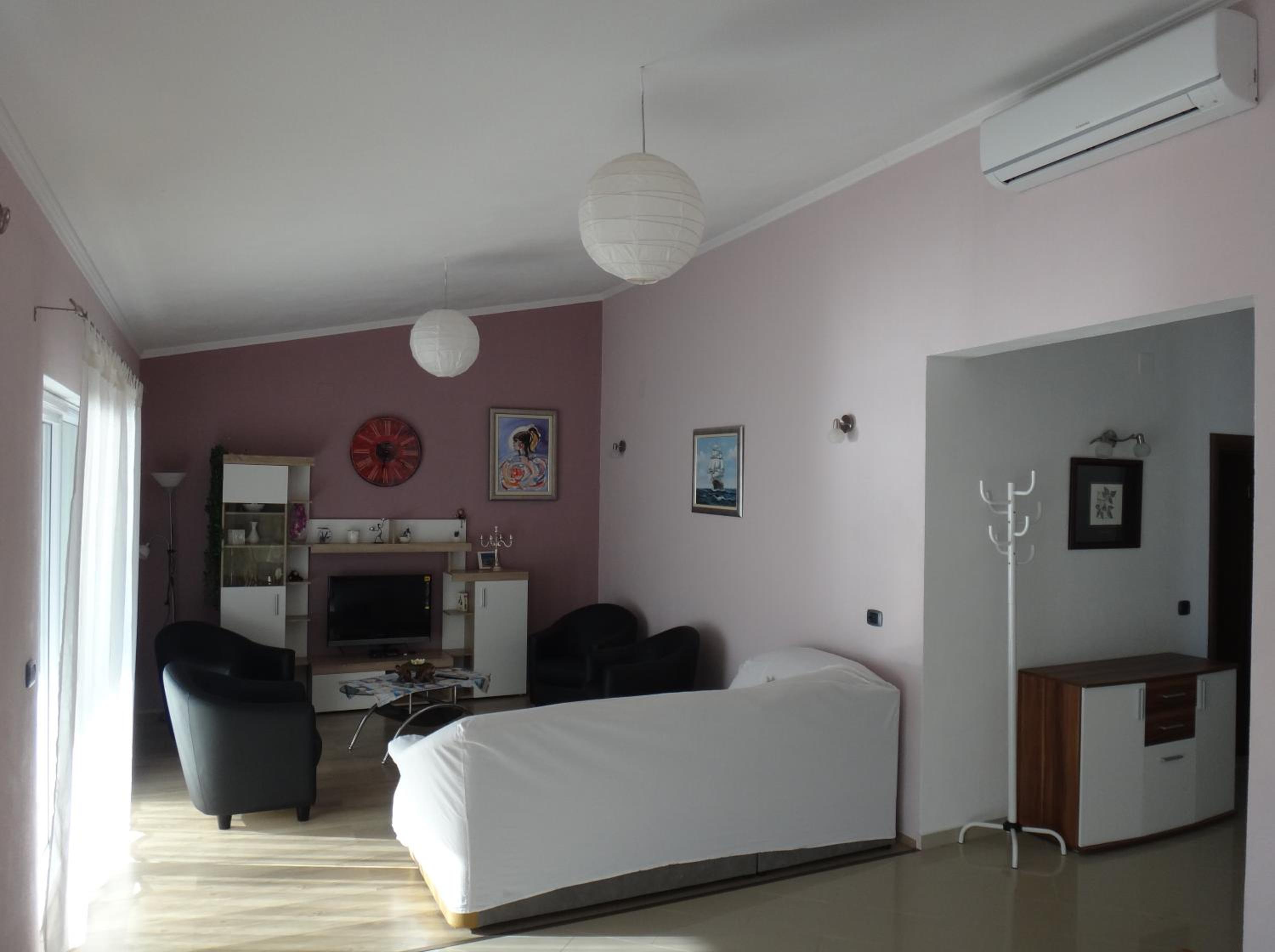 Three-Bedroom Apartment photo 1