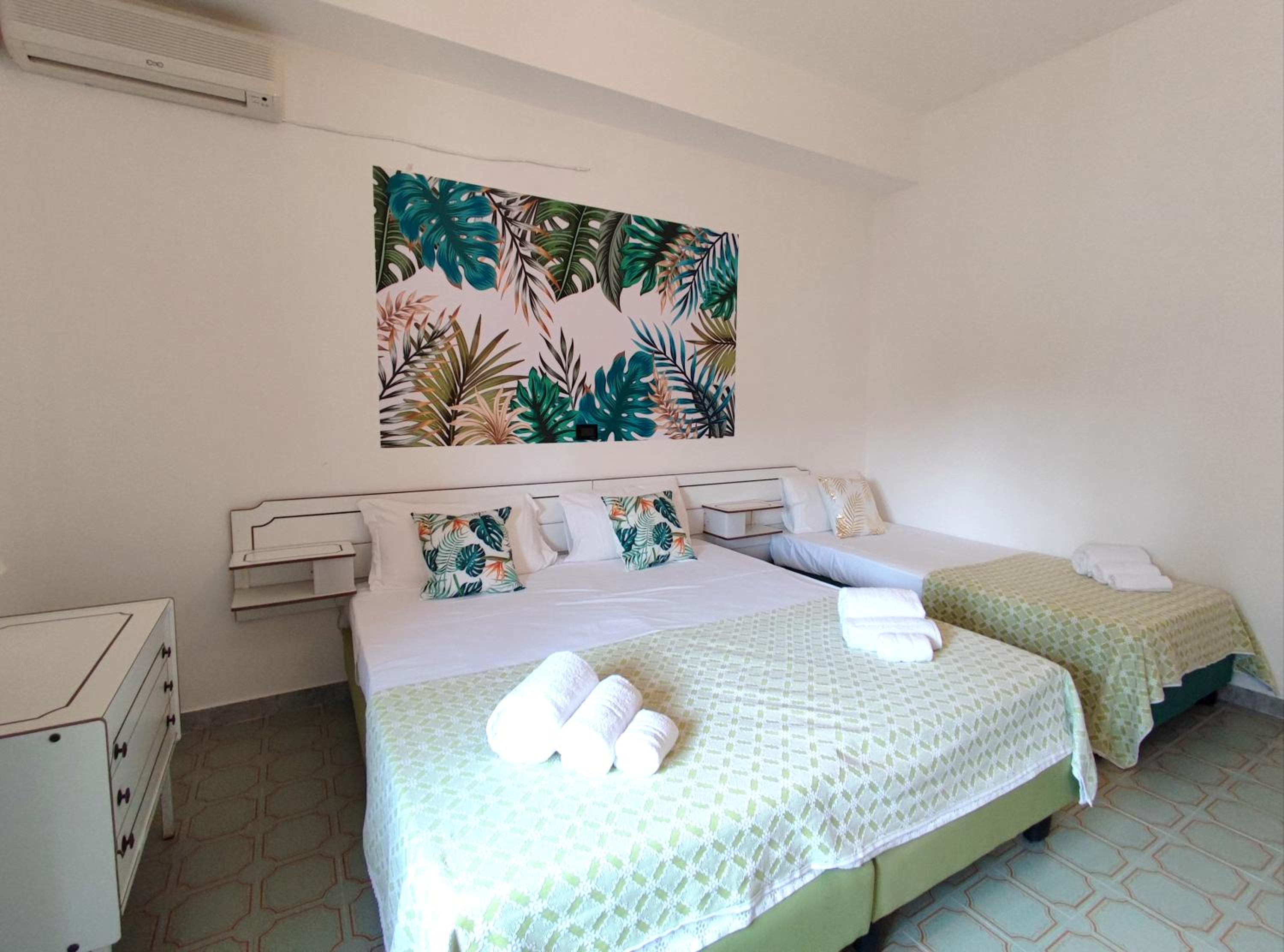 Standard Quadruple Room - Photo 7