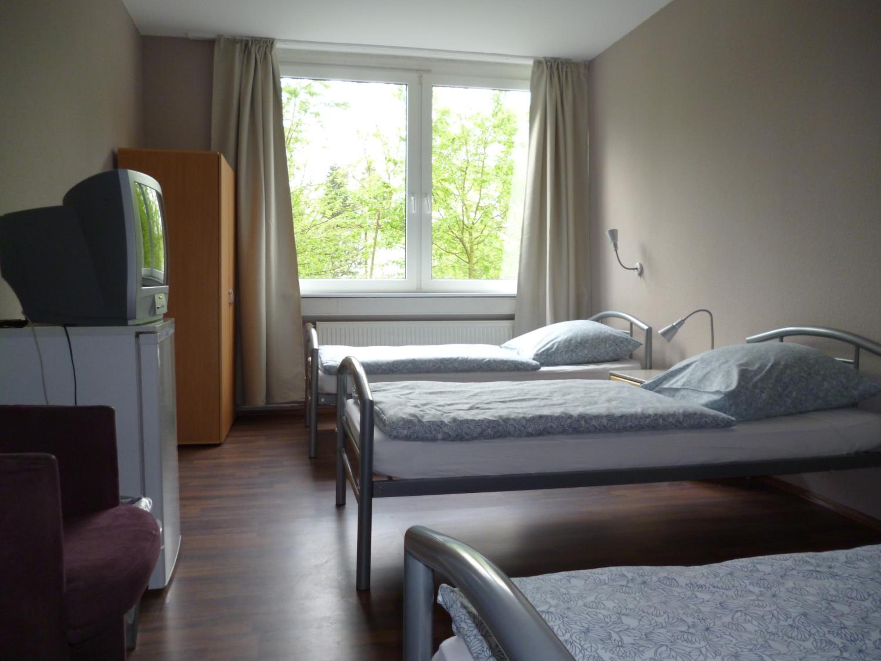 Basic Triple Room With Shared Bathroom