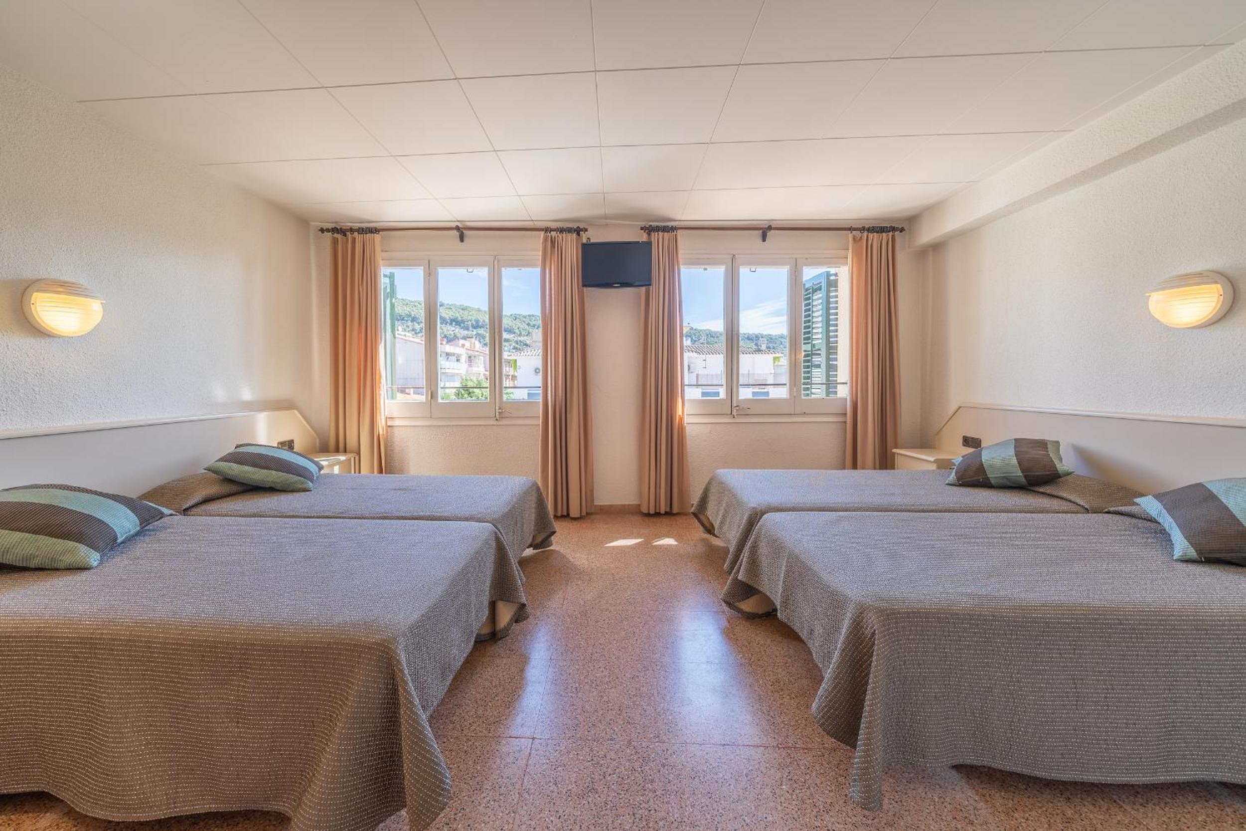 Habitación Familiar (2 Adultos + 2 Niños)