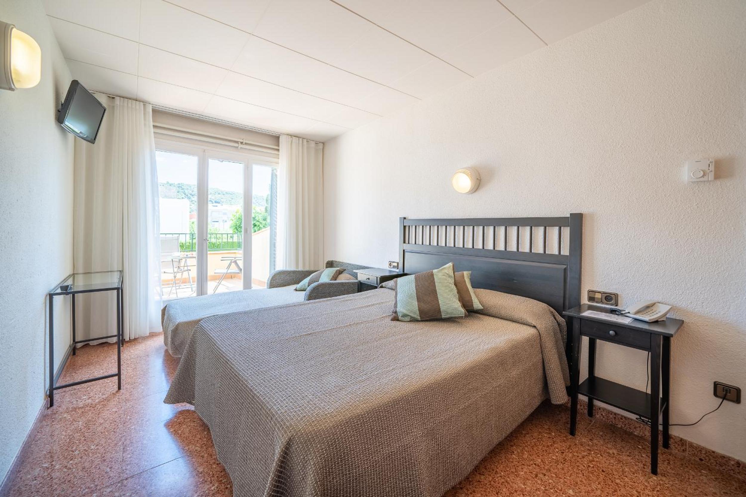 Habitación triple (2 adultos + 1 niño)