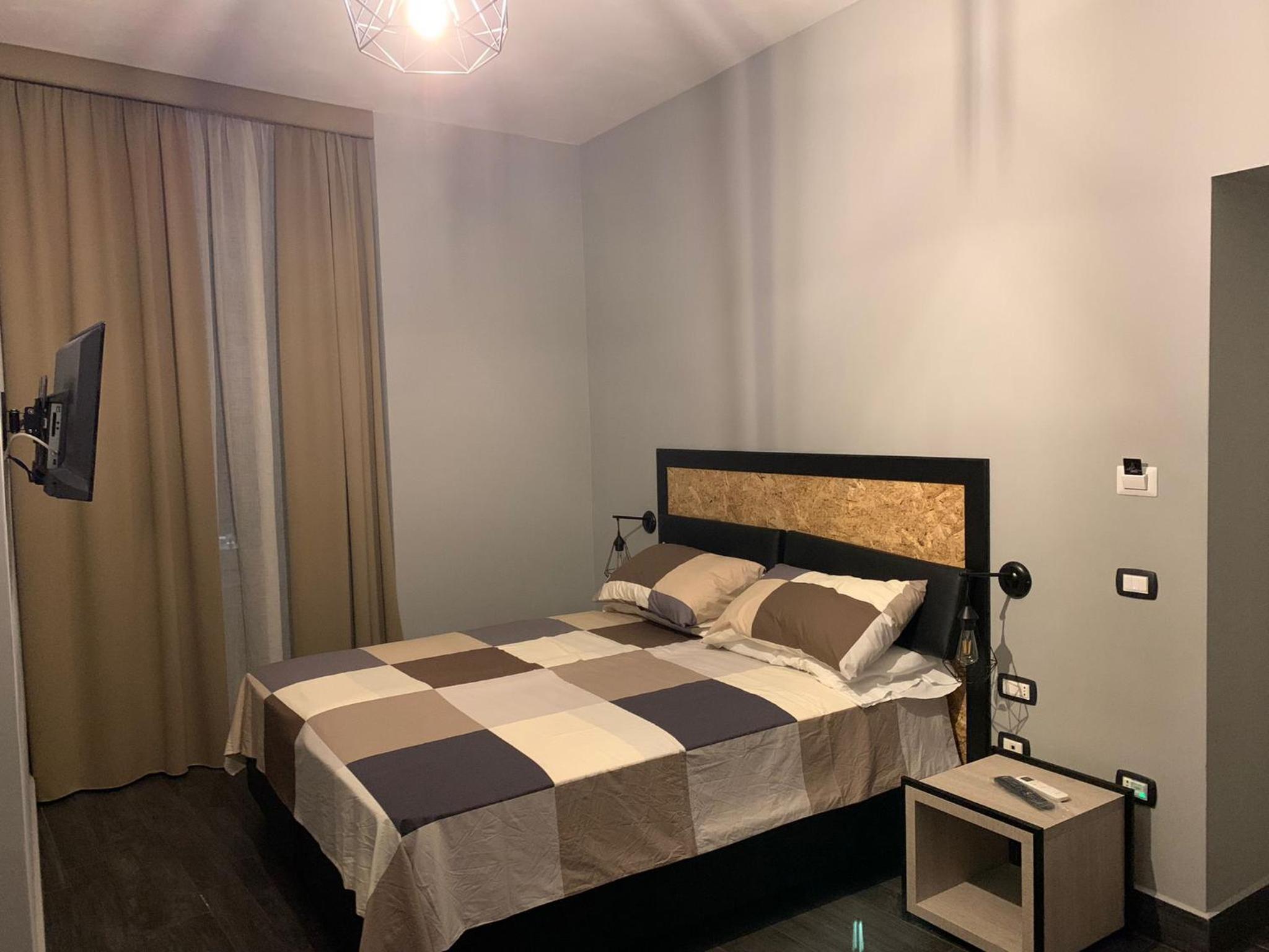 Quadruple Room with Private Bathroom