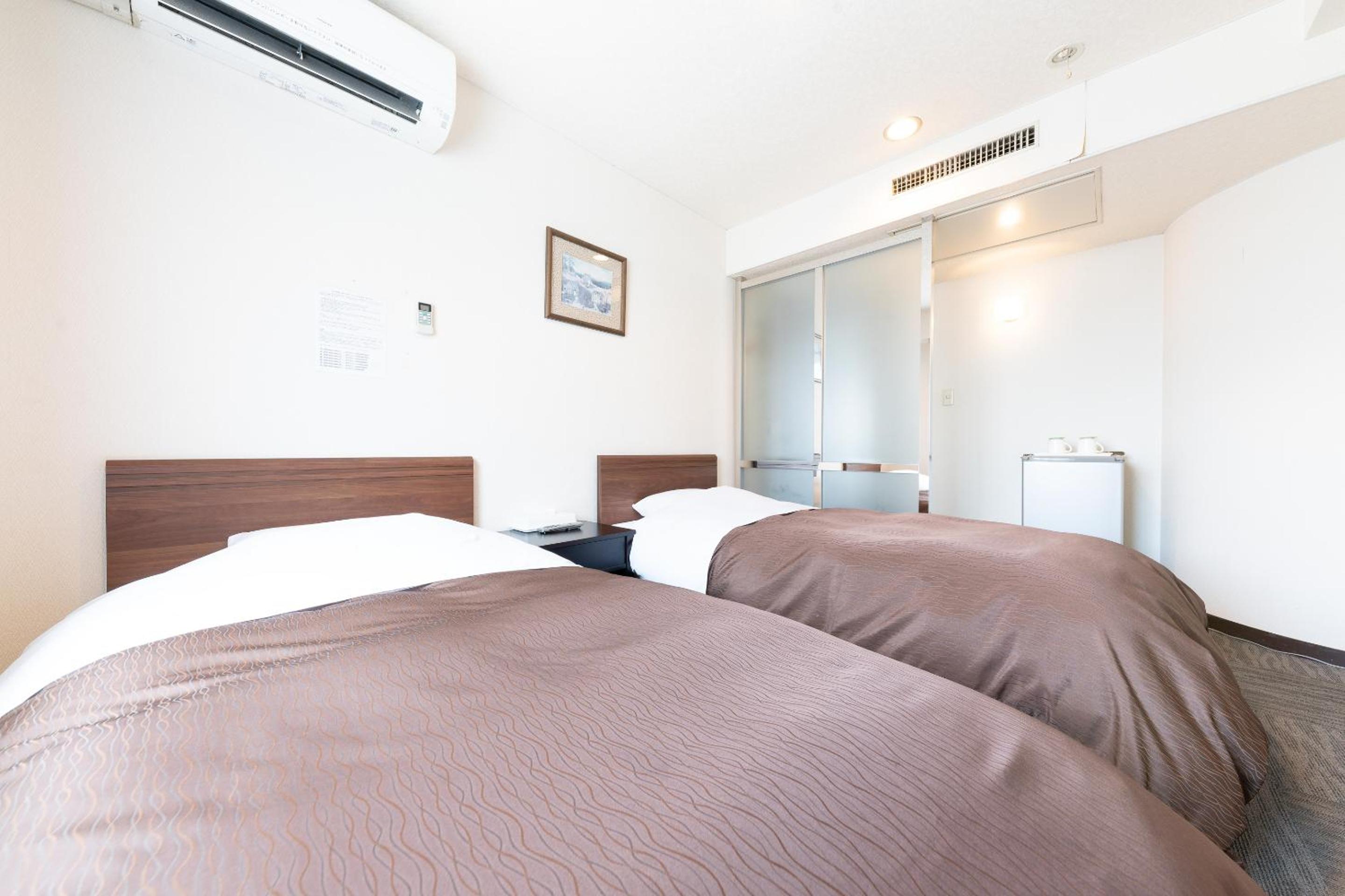 Twin Room - Non-Smoking - Photo 1