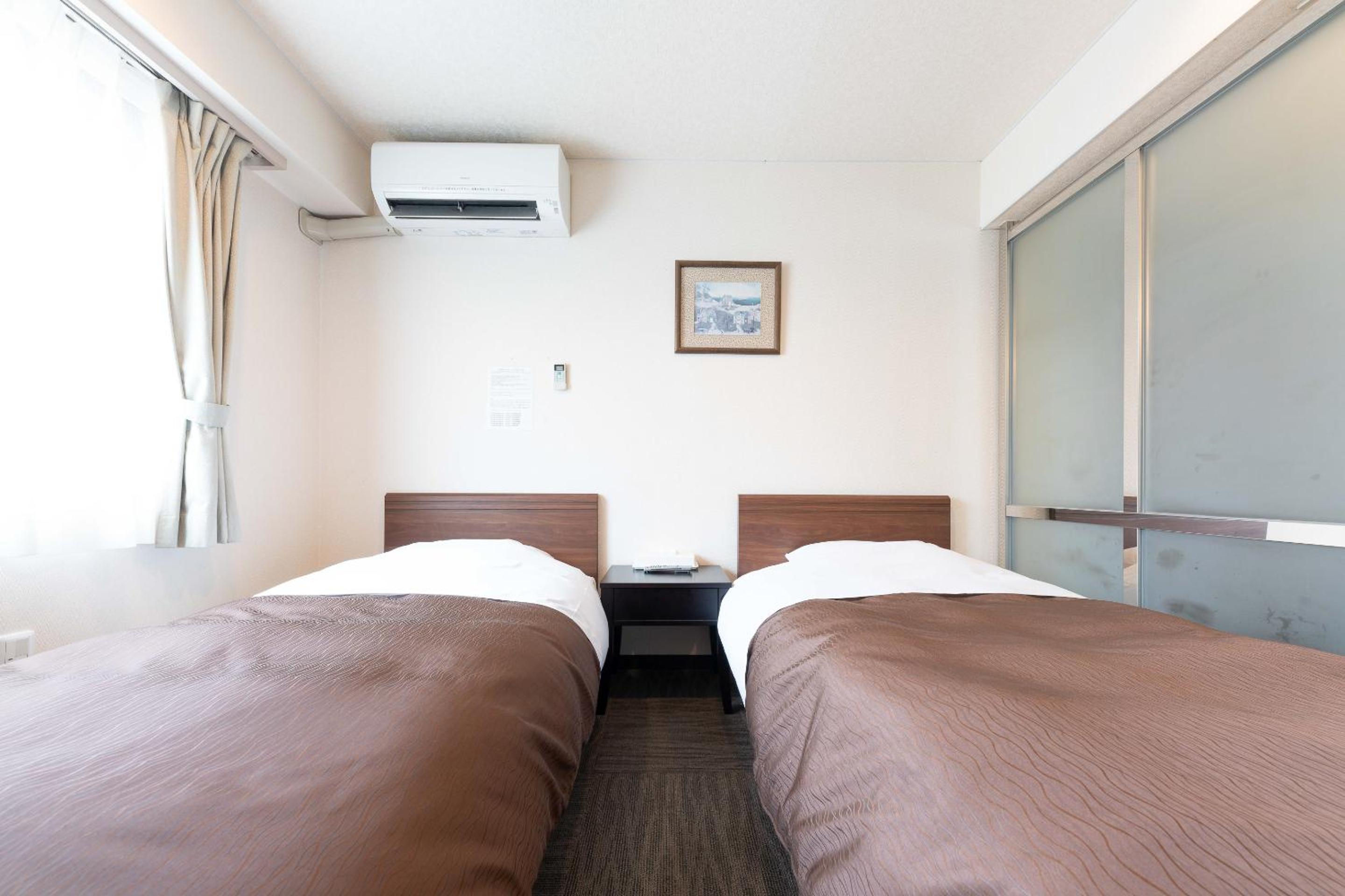 Twin Room - Non-Smoking - Photo 6