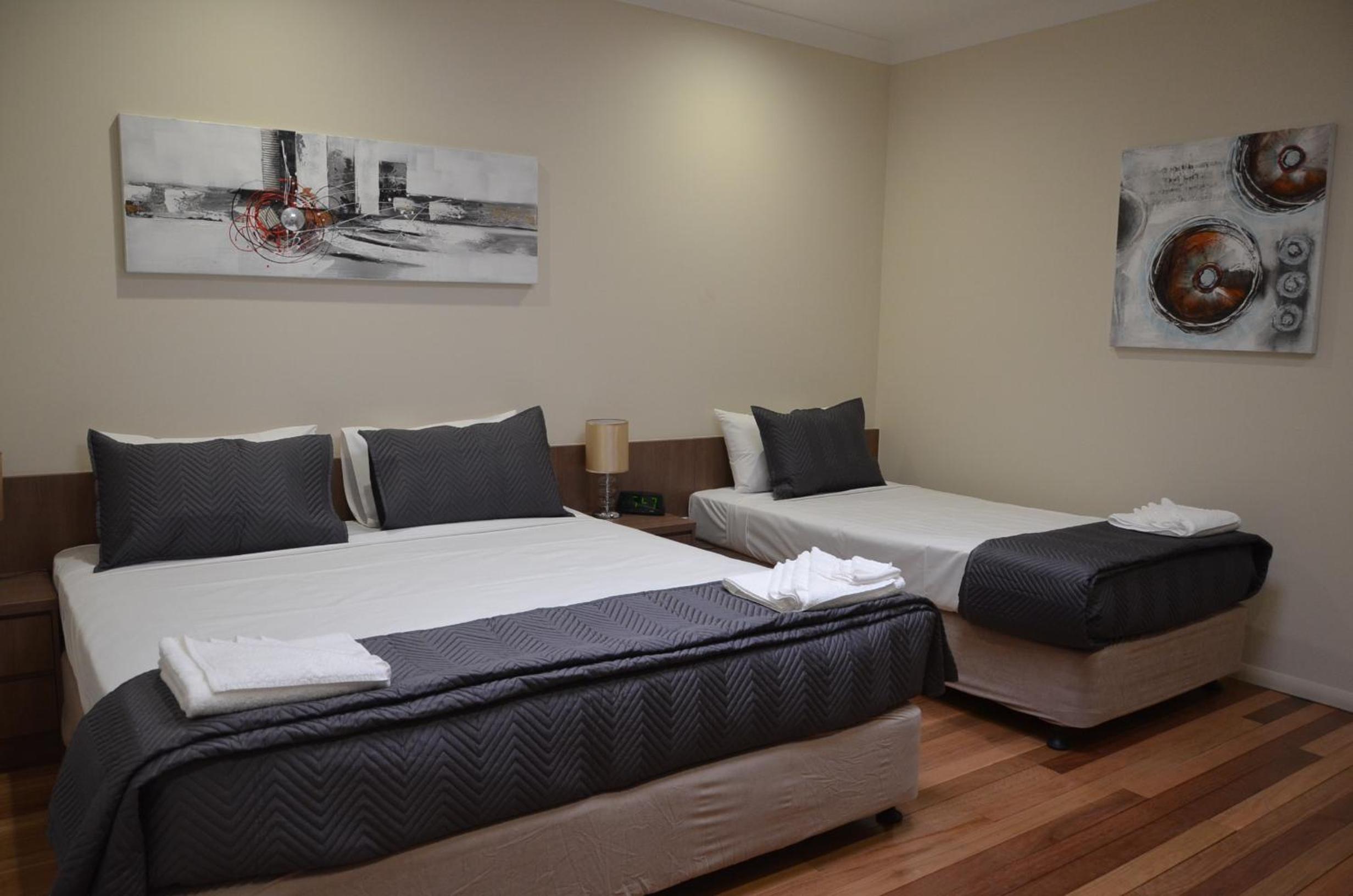 Queen & Single Room– Skylight, No Windows