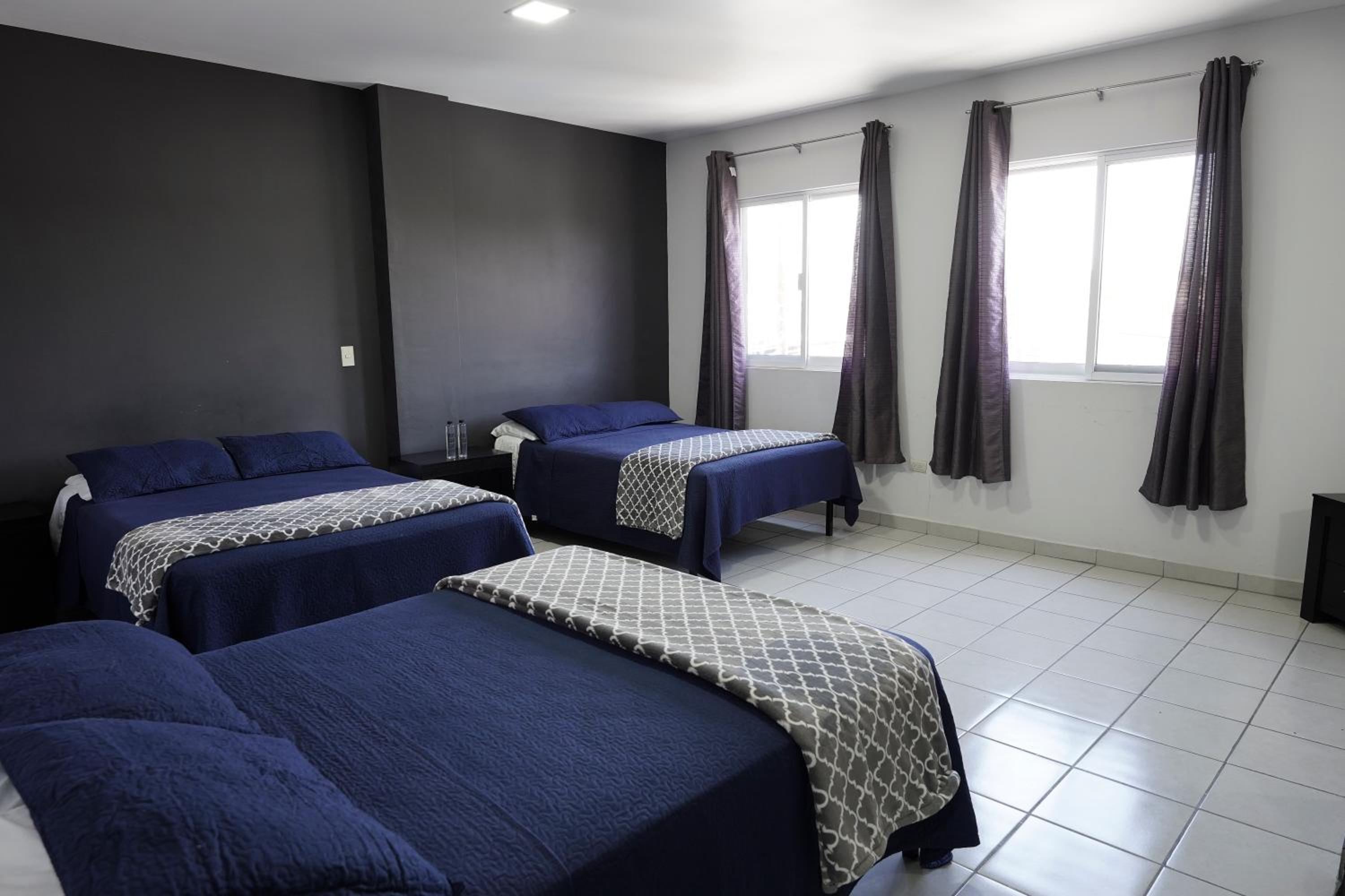 Triple Room - Photo 1