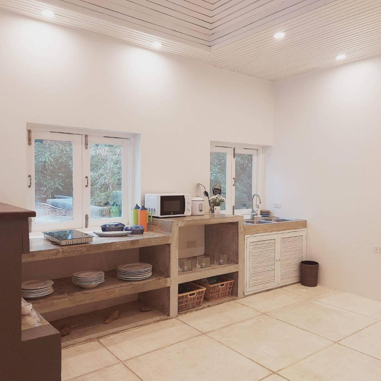Three-Bedroom House - Photo 41