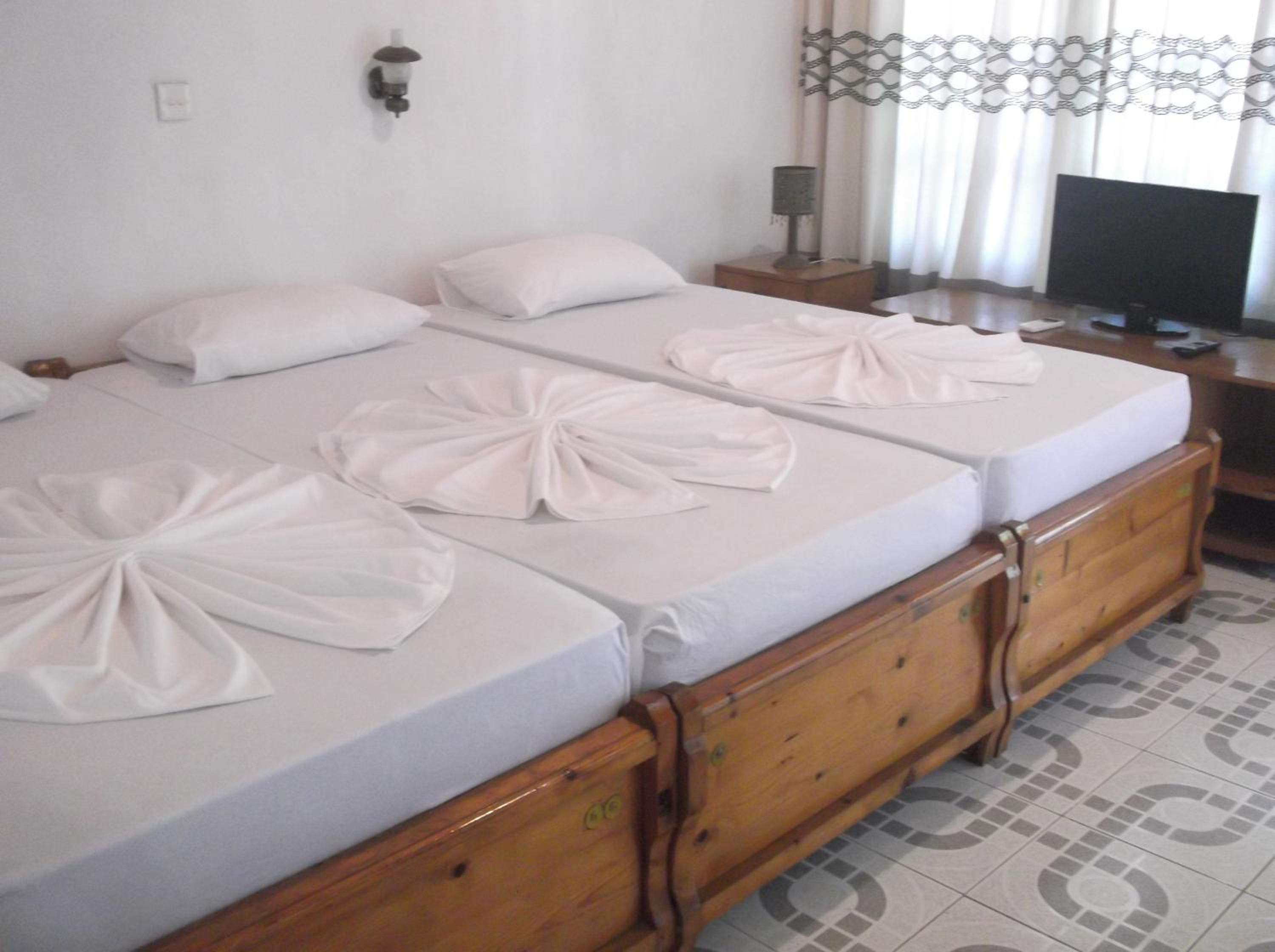 Standard Triple Room with Balcony