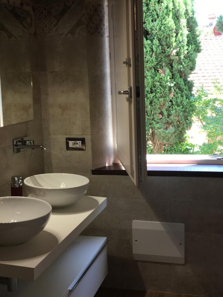 Three-Bedroom House - Photo 31