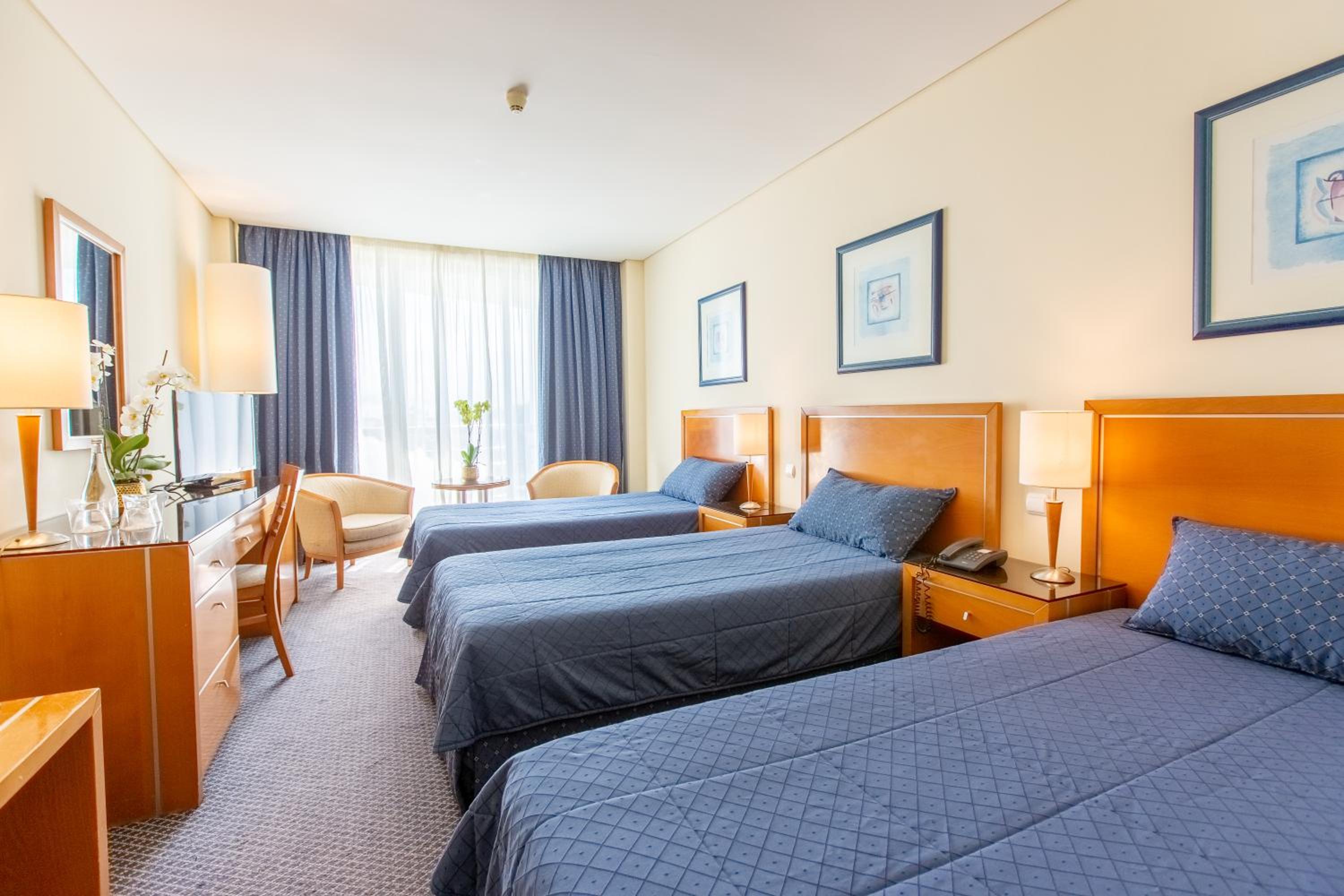 Triple Room - Photo 1