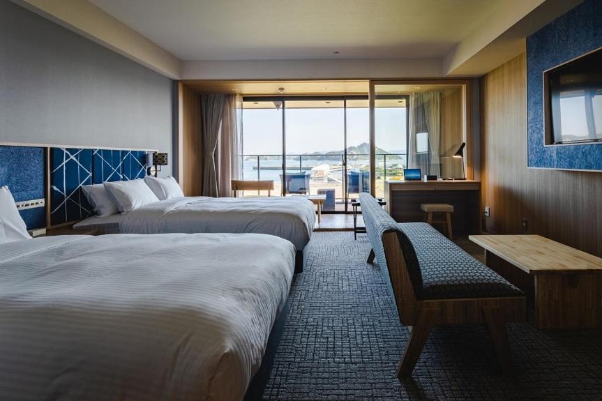Deluxe Twin Room with Sea View - Photo 1