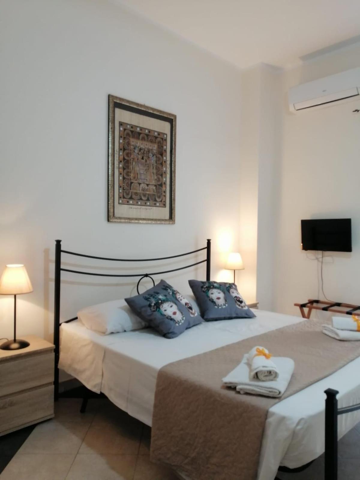 Quadruple Room with Balcony - Photo 1