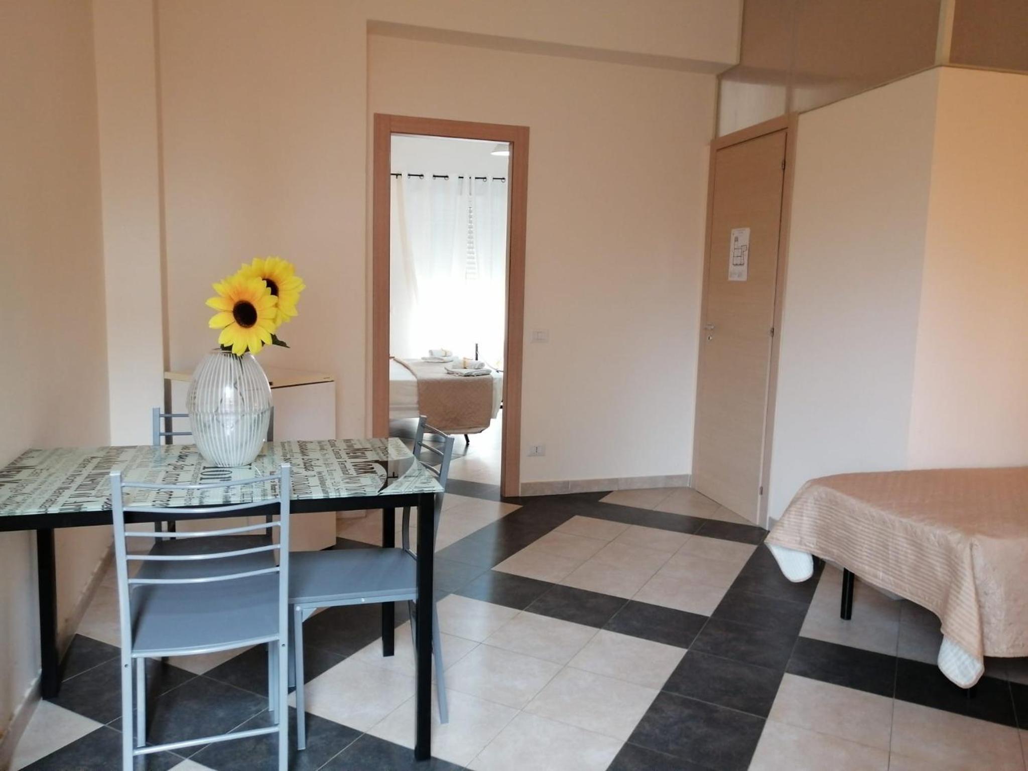 Quadruple Room with Balcony - Photo 8