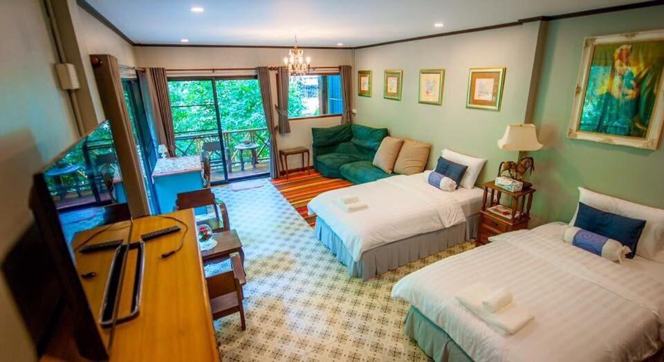 Family Room with Balcony - Photo 3