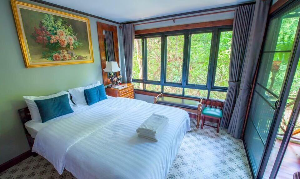 Family Room with Balcony - Photo 1