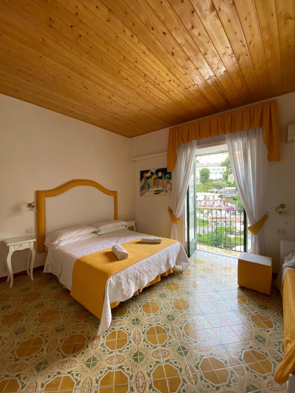 Quarto Triplo com Vista para a Cidade