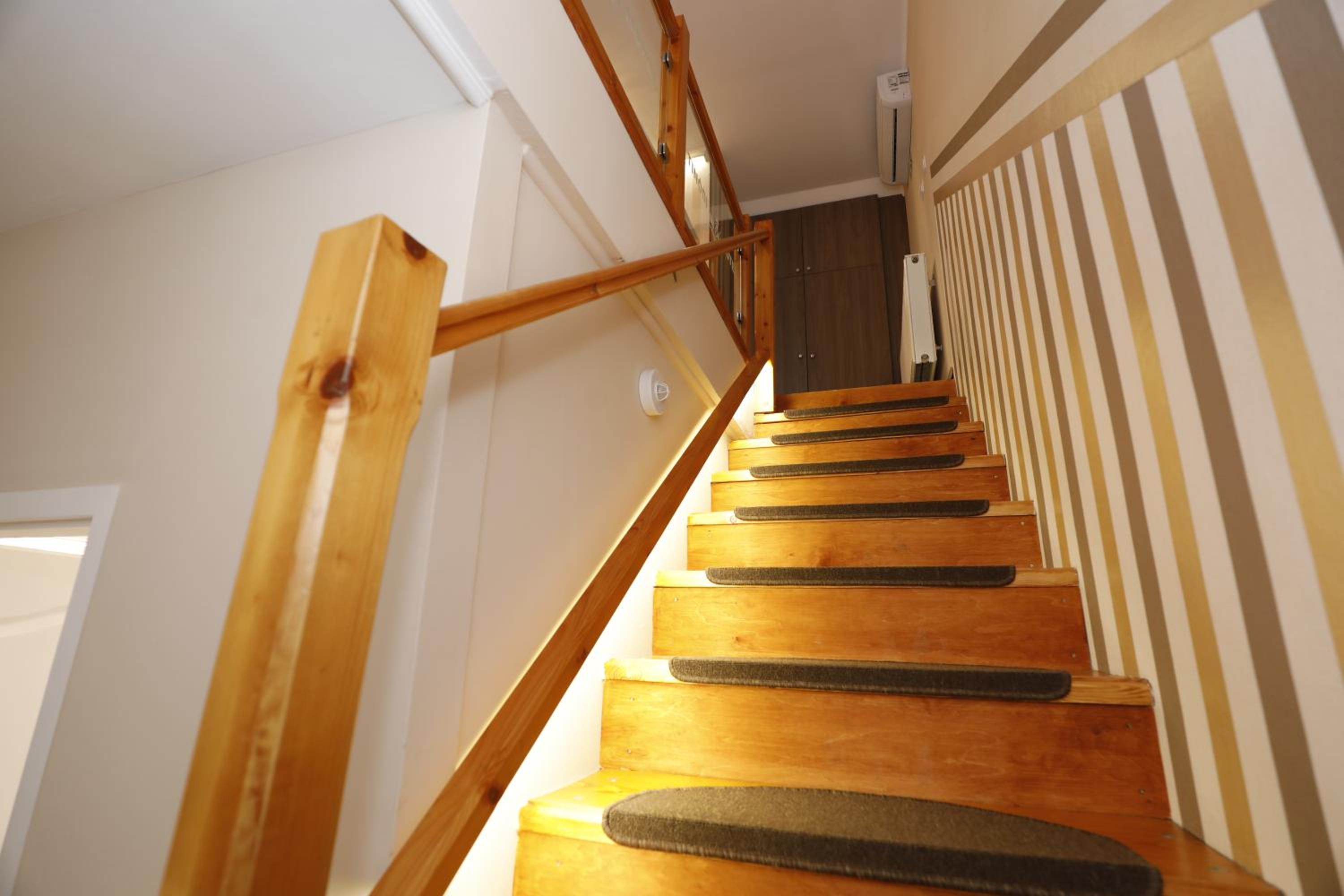 Deluxe Quadruple Room - Photo 8