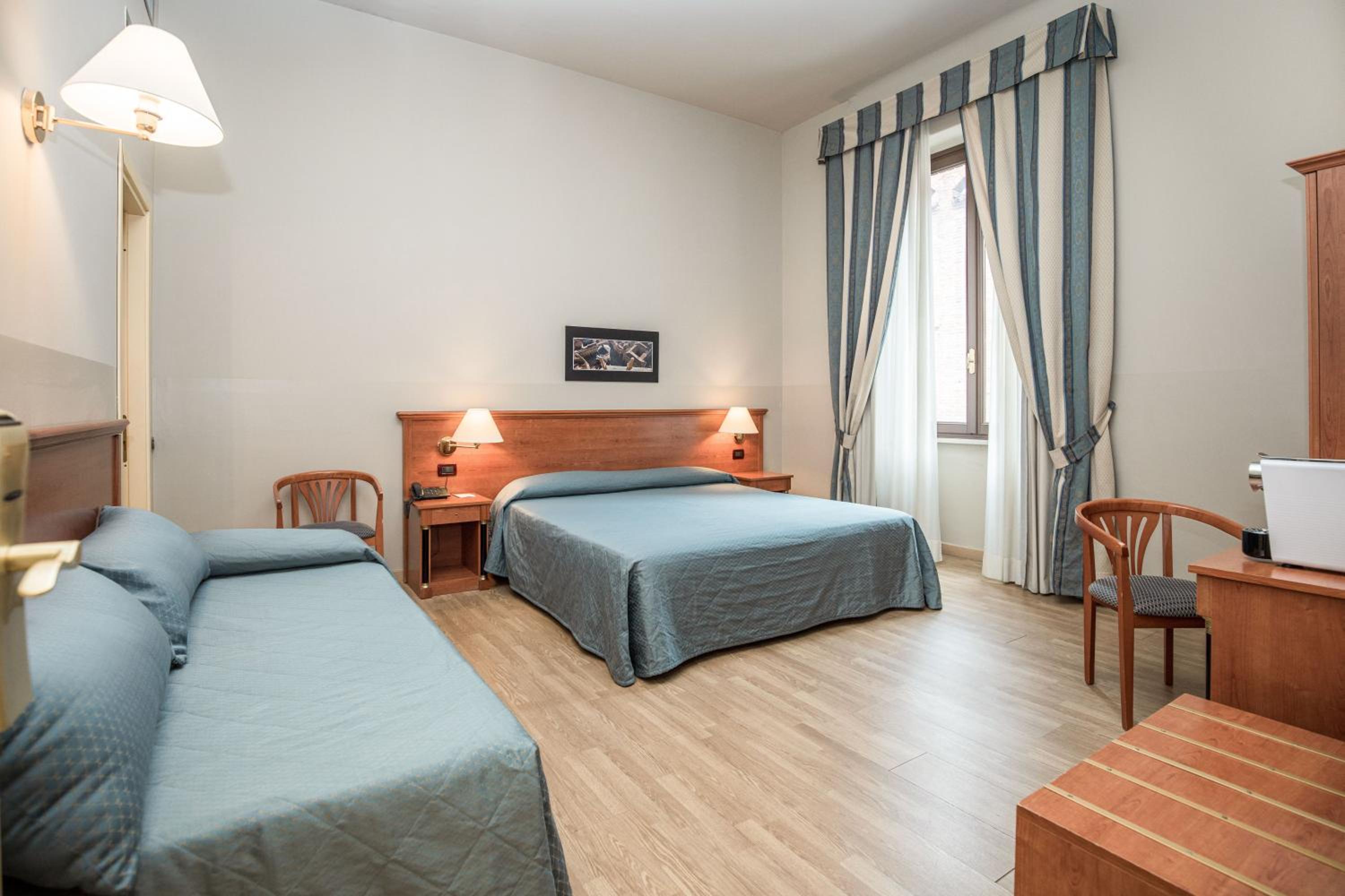 Triple Room - Photo 1