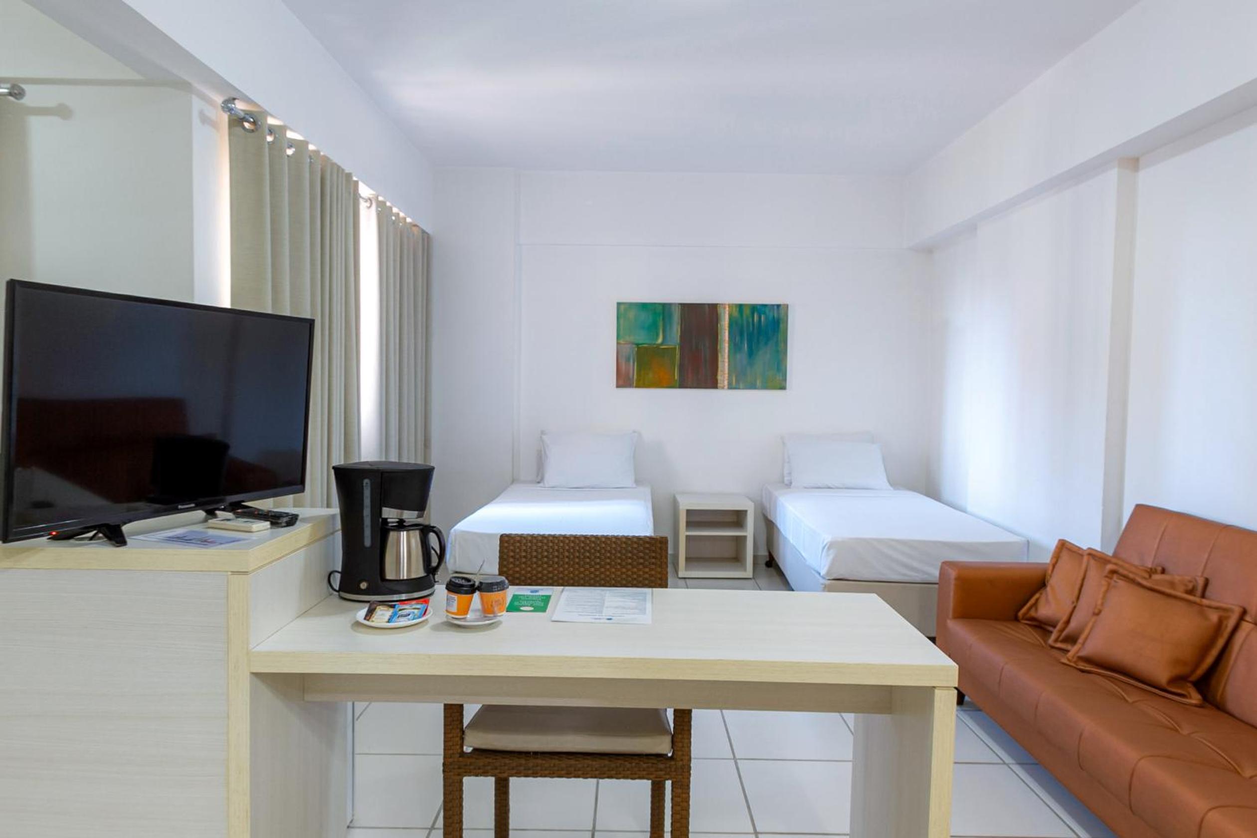 Deluxe Queen Suite with Sofa Bed photo 3