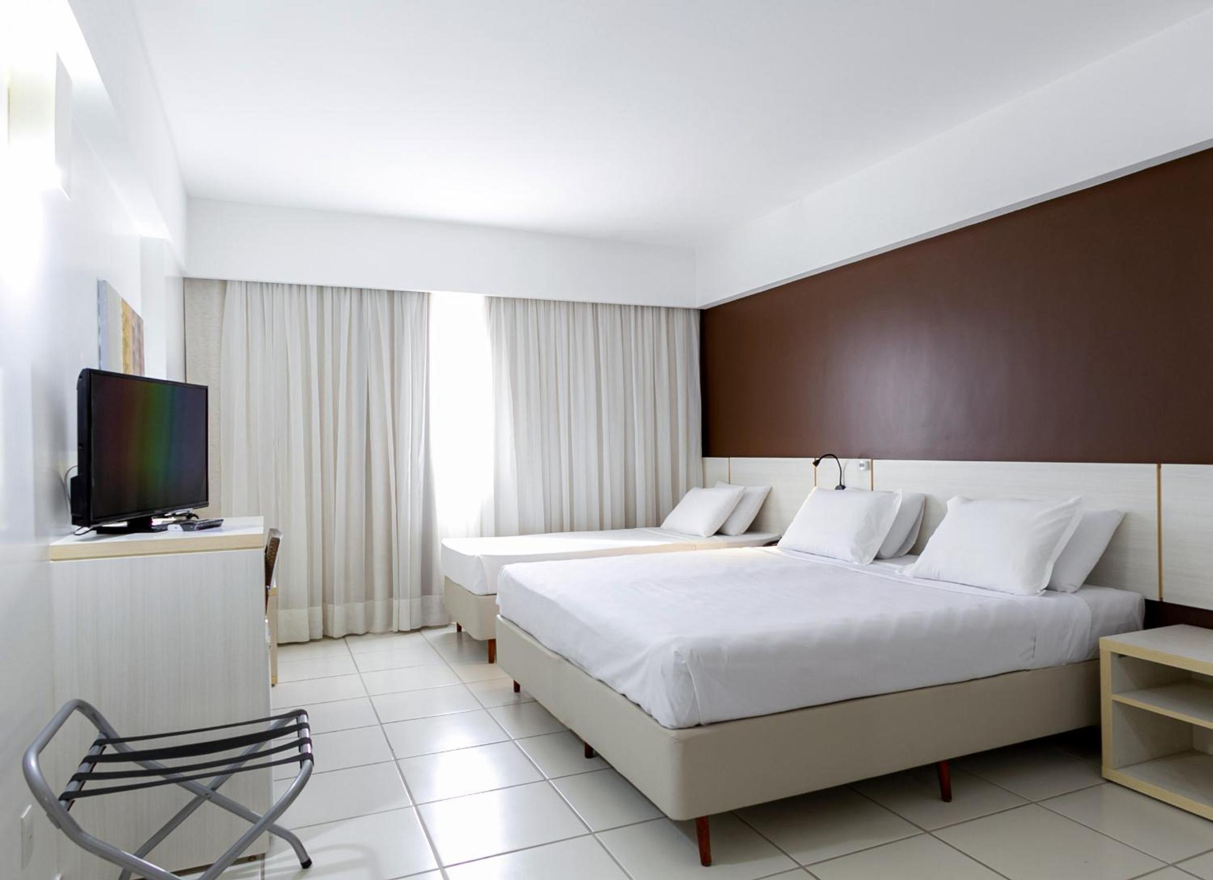 Deluxe Room with One Queen and One Single Bed photo 3