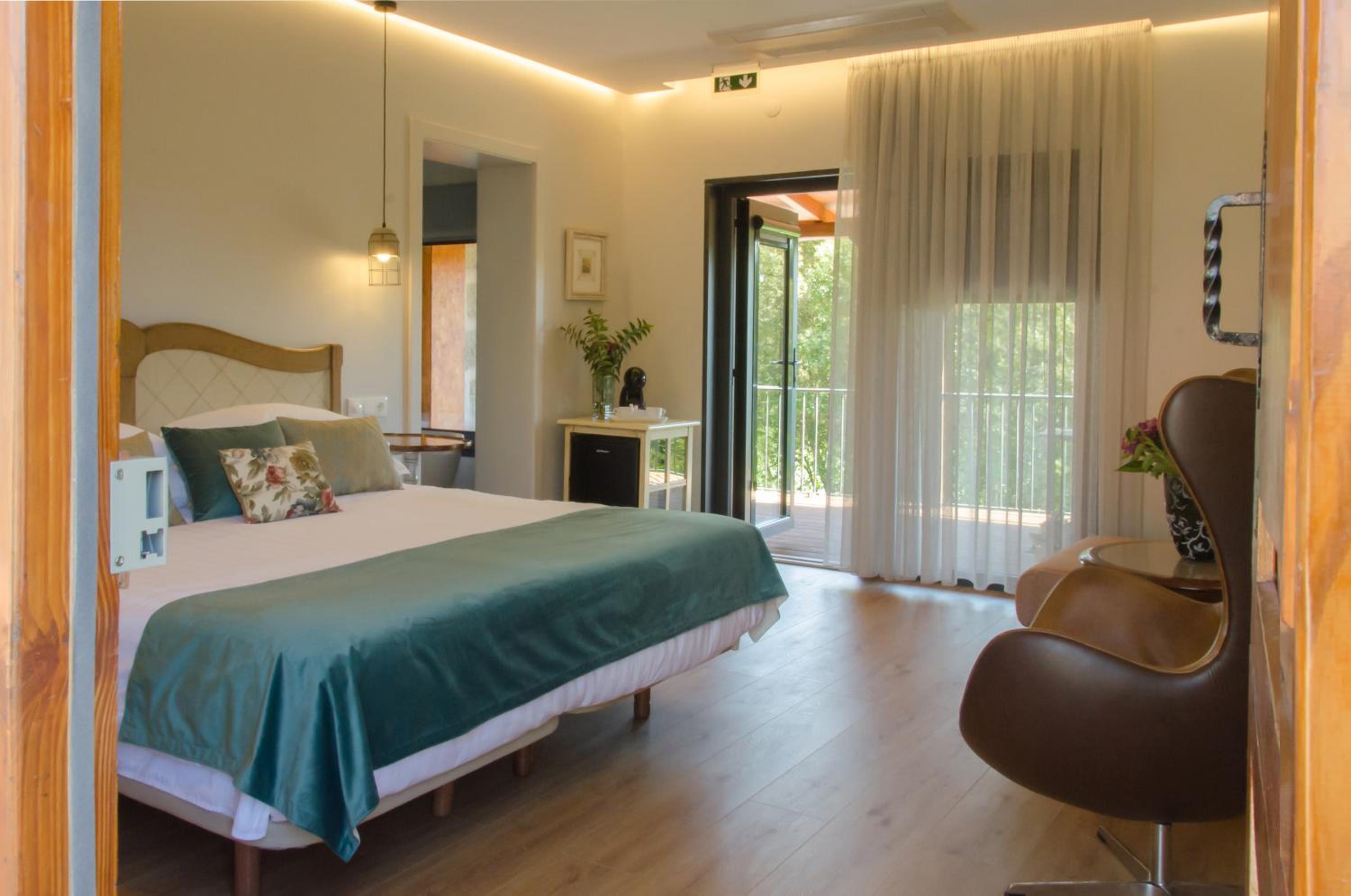 King Suite with Balcony - Photo 1