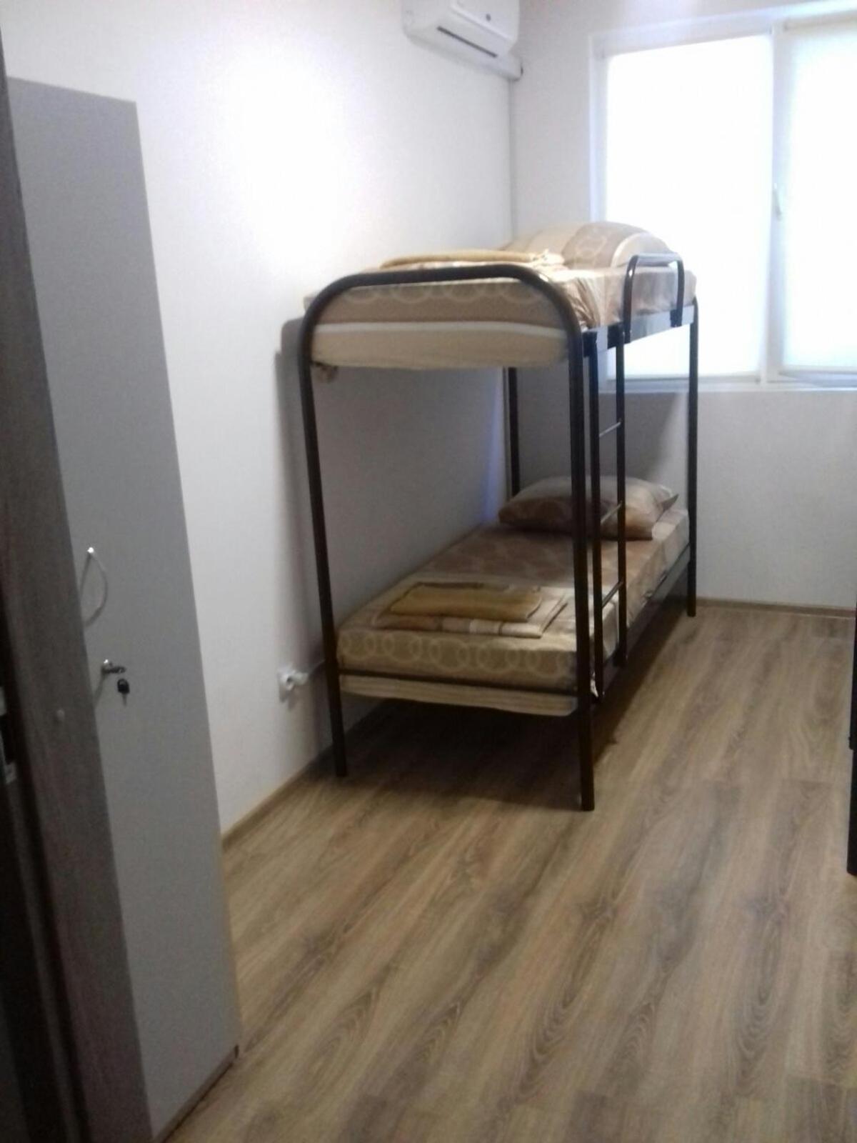 Single Bed In Dormitory Room