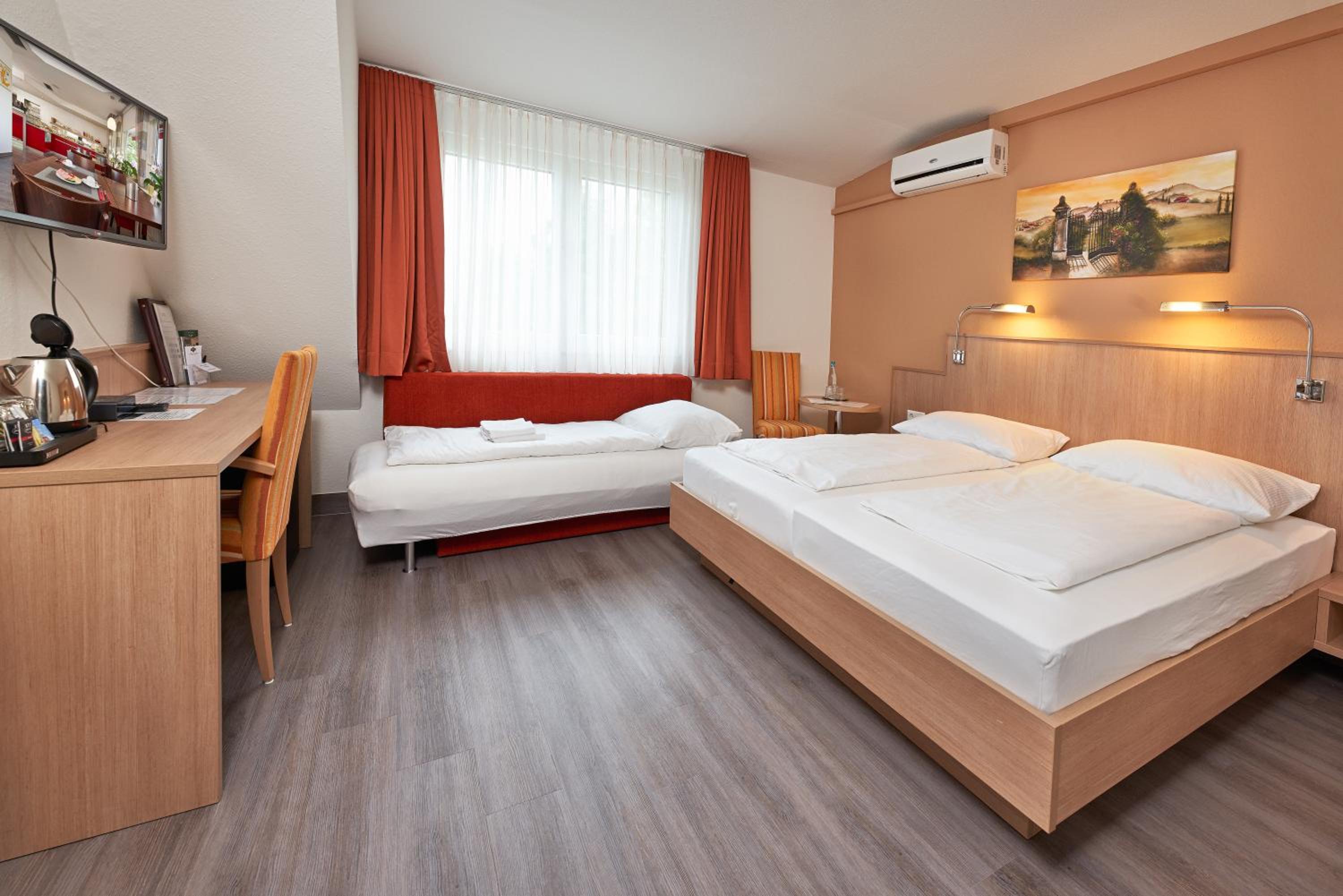 Triple Room (2 Adults + 1 Child) photo 1