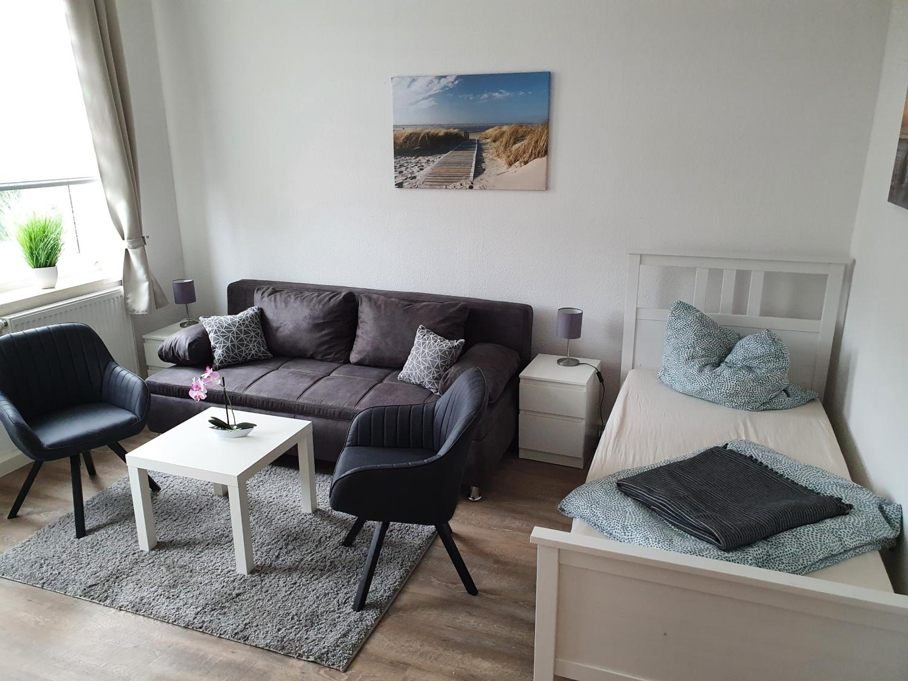Three-Bedroom Apartment photo 1