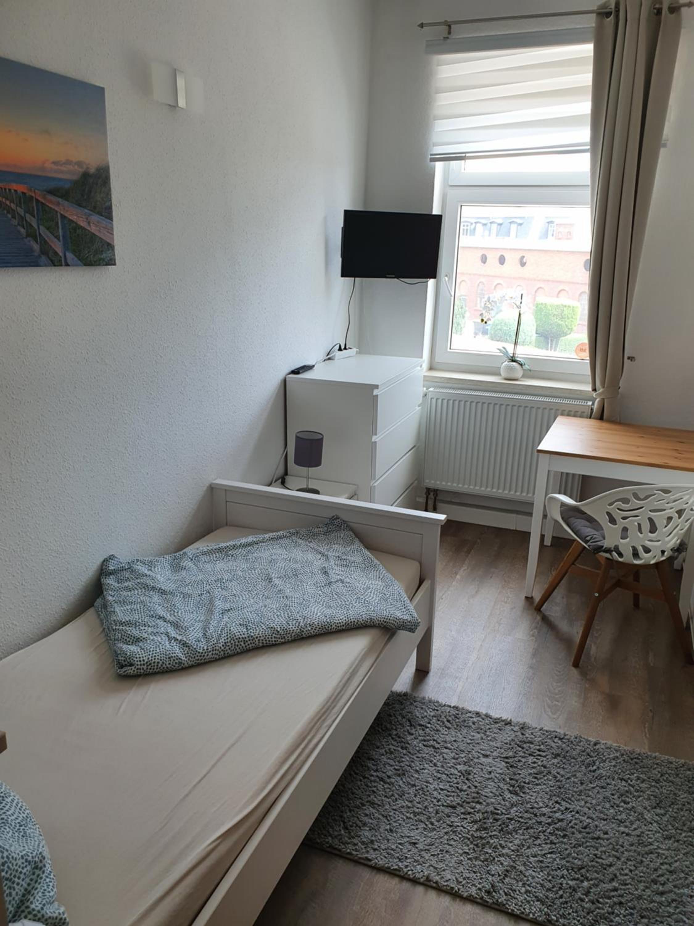 Three-Bedroom Apartment photo 3