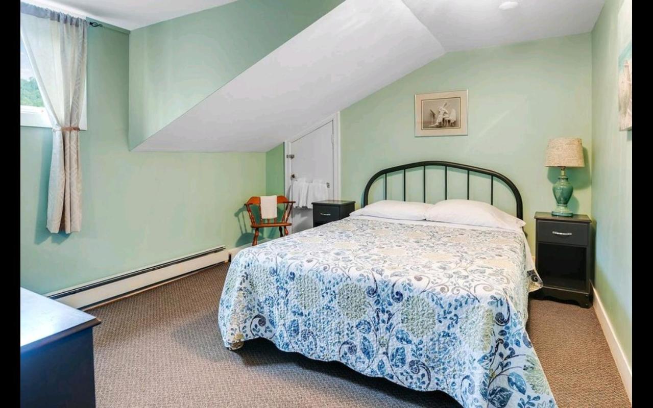 Queen Room with Shared Bathroom