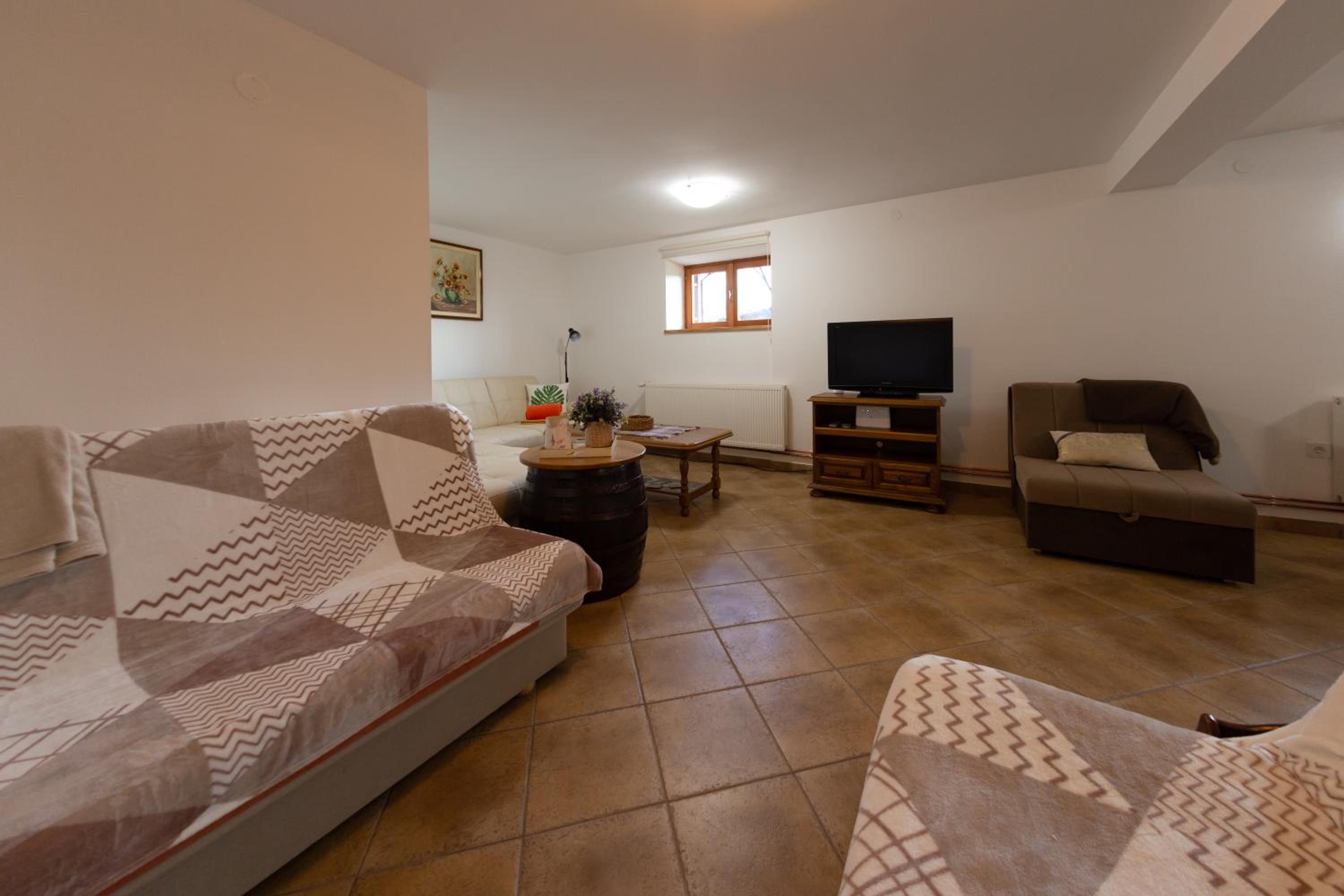 Three-Bedroom House - Photo 24