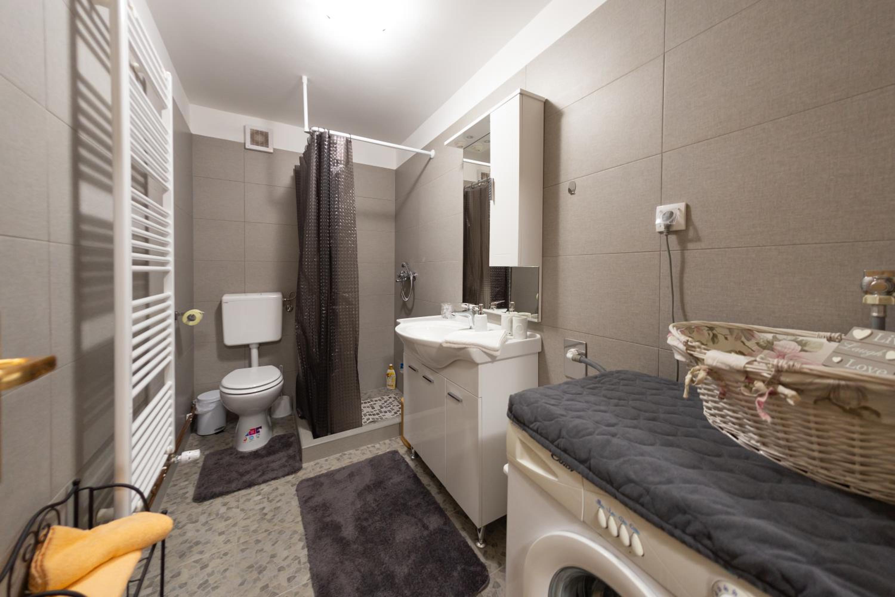 Three-Bedroom House - Photo 23