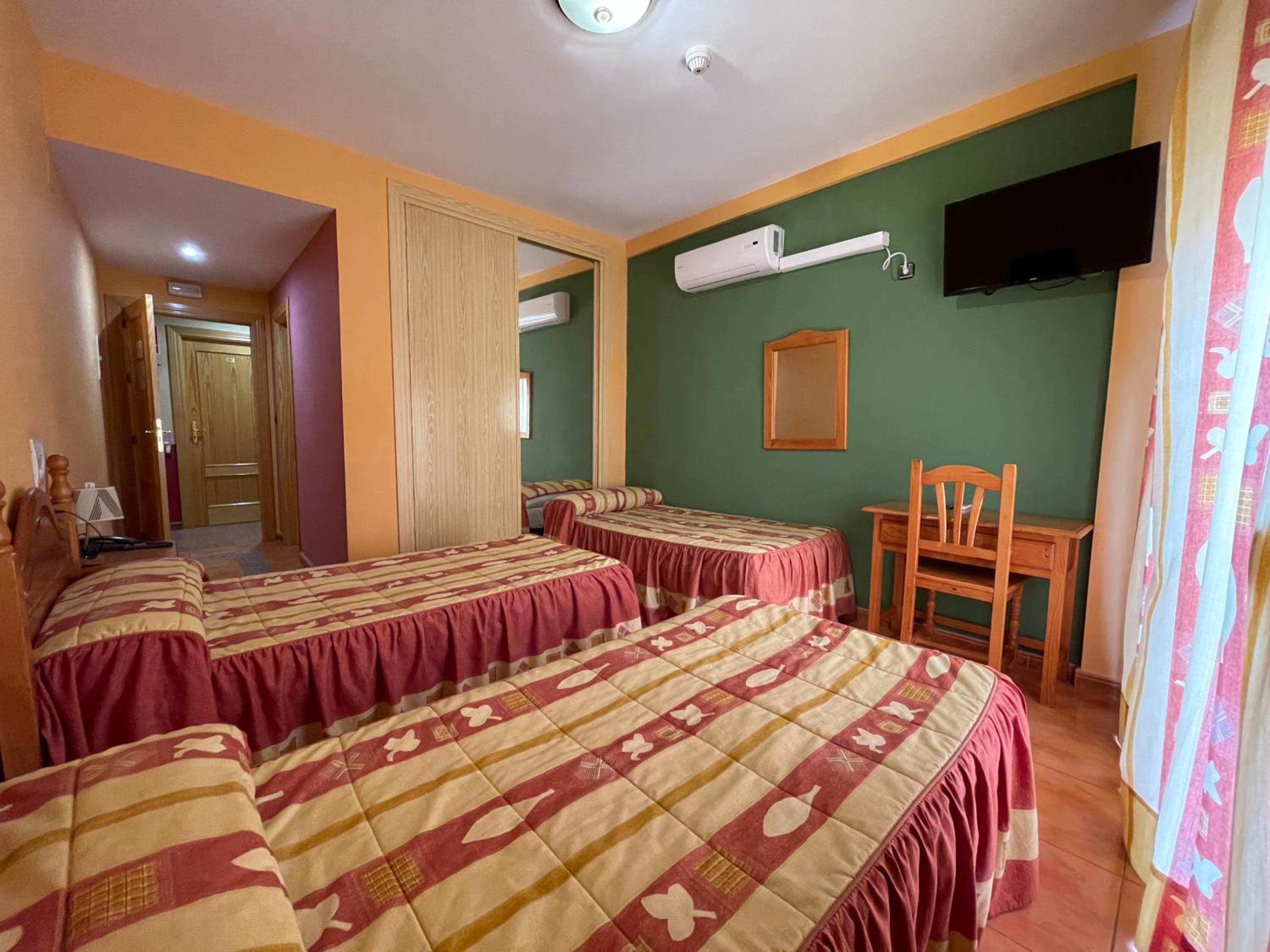 Triple Room - Photo 1