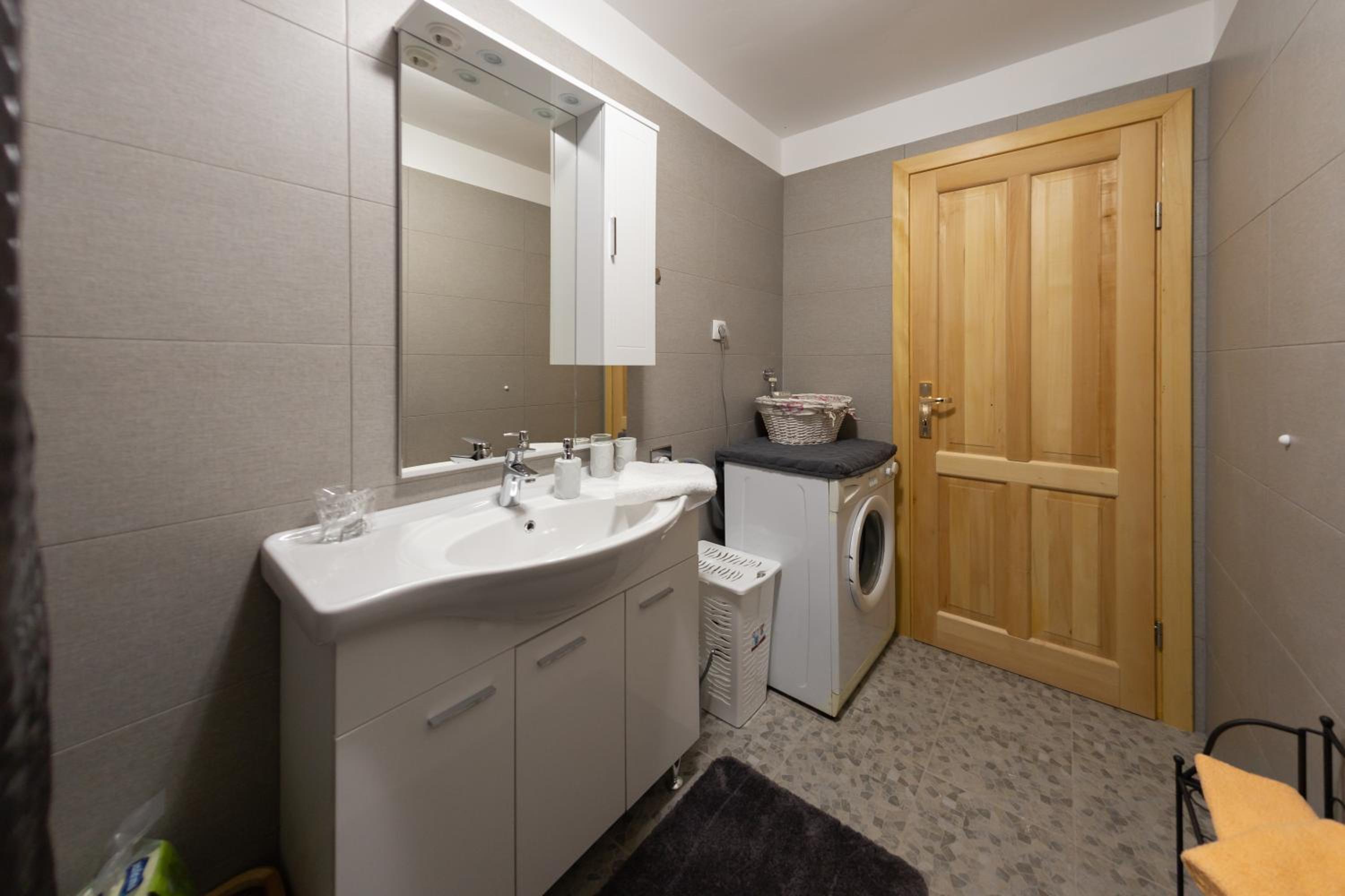 Three-Bedroom House - Photo 16