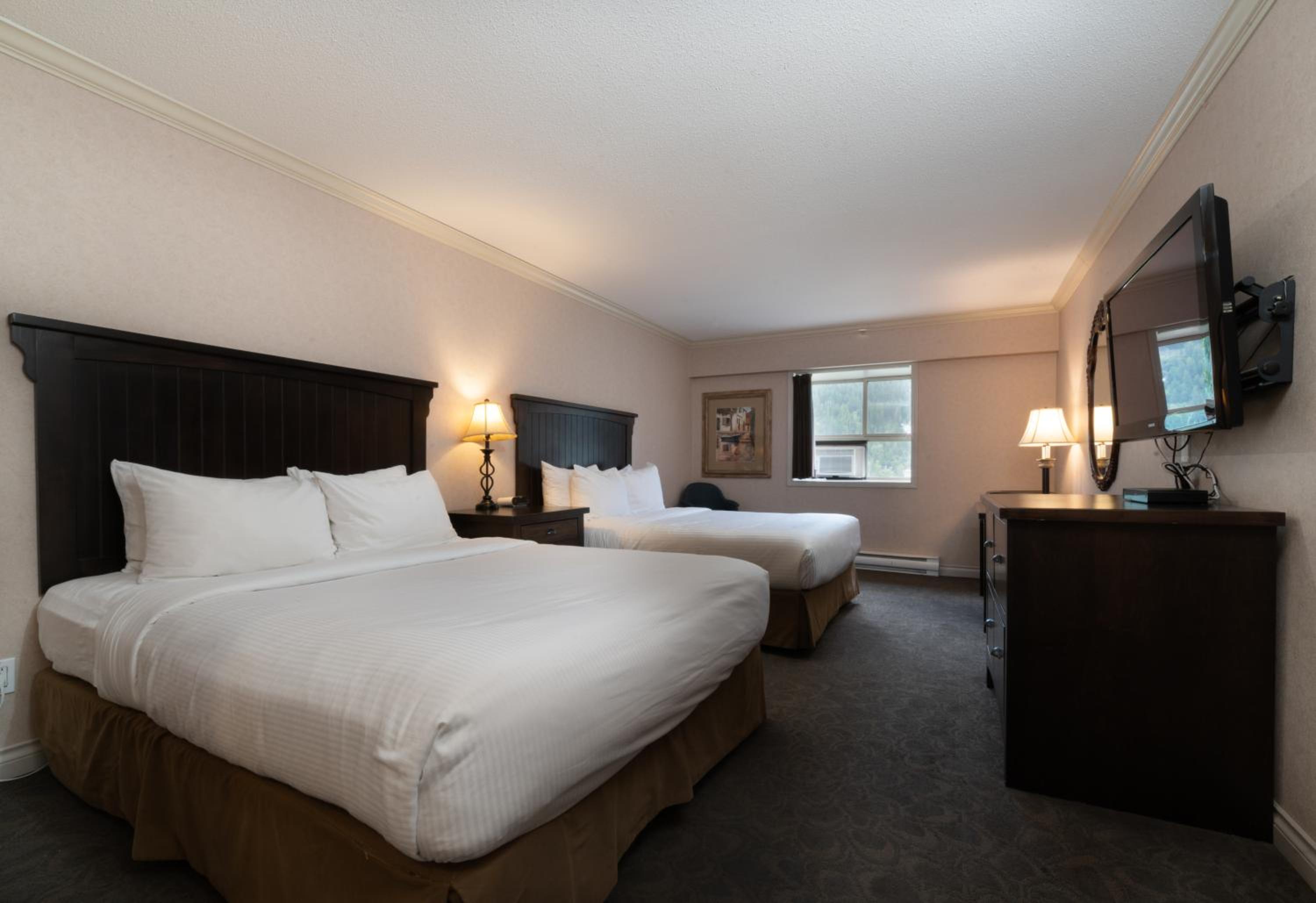 Queen Room with Two Queen Beds - Photo 1