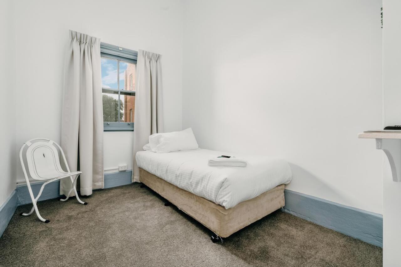 Queen Room with Shared Bathroom