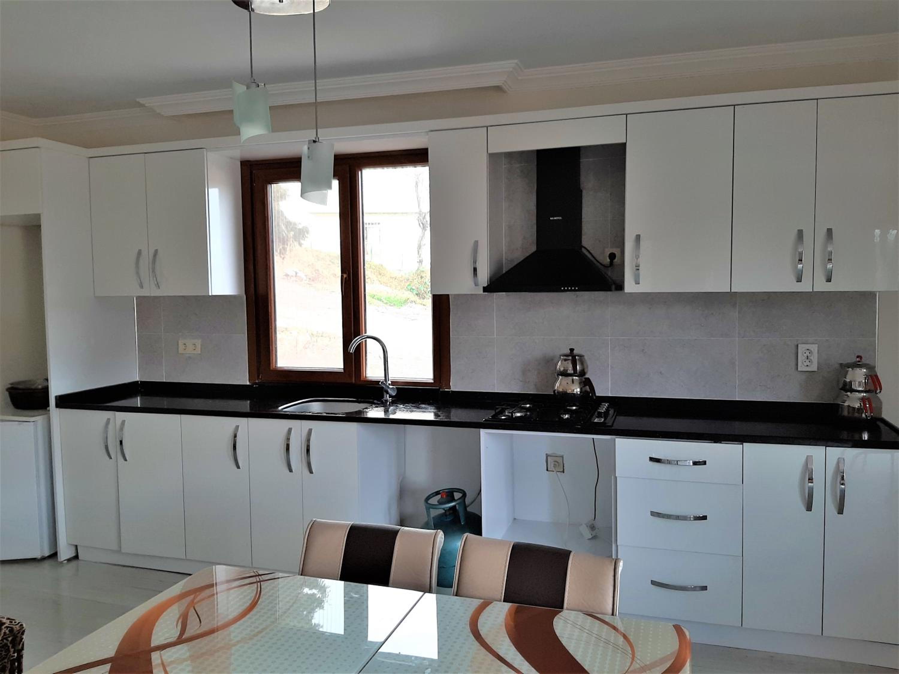 Three-Bedroom Apartment - Photo 19
