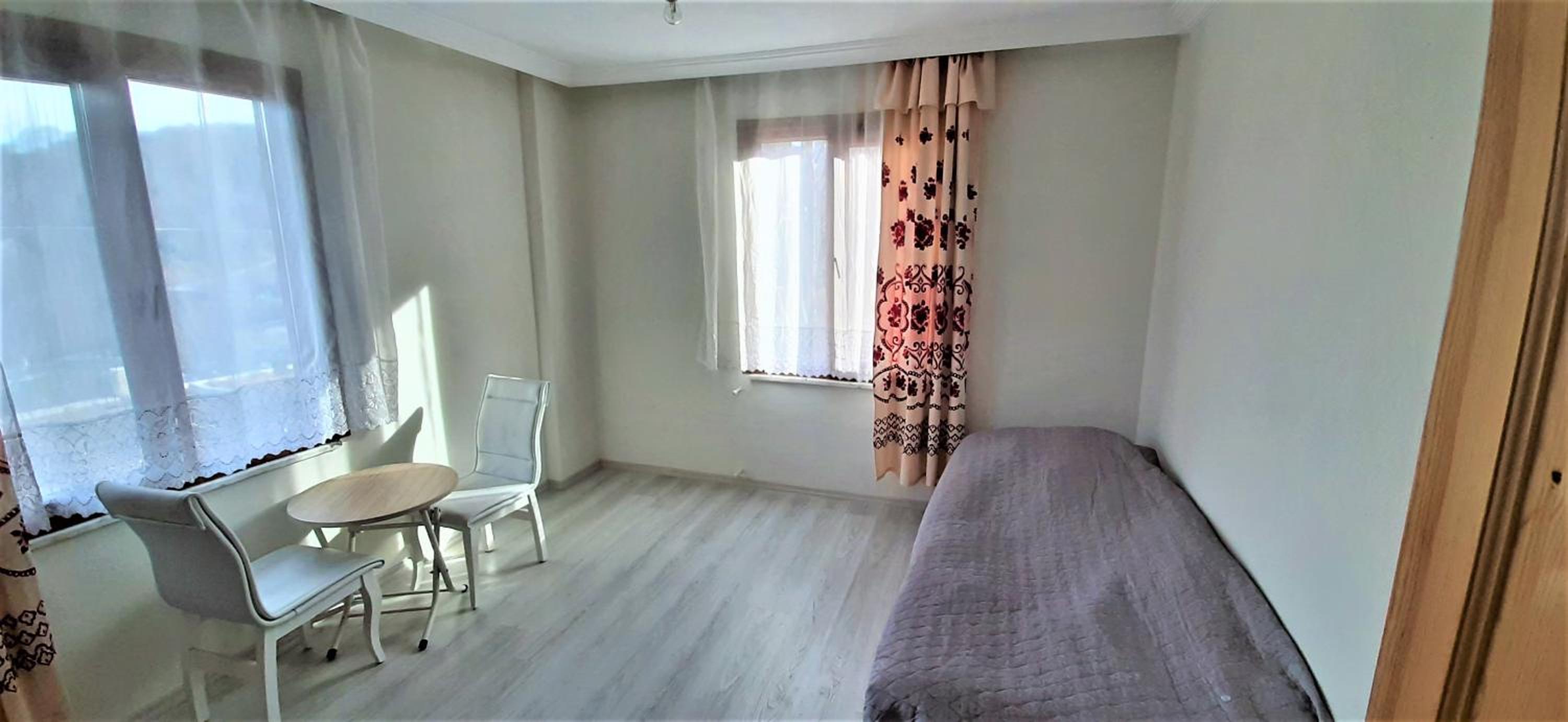 Three-Bedroom Apartment - Photo 22