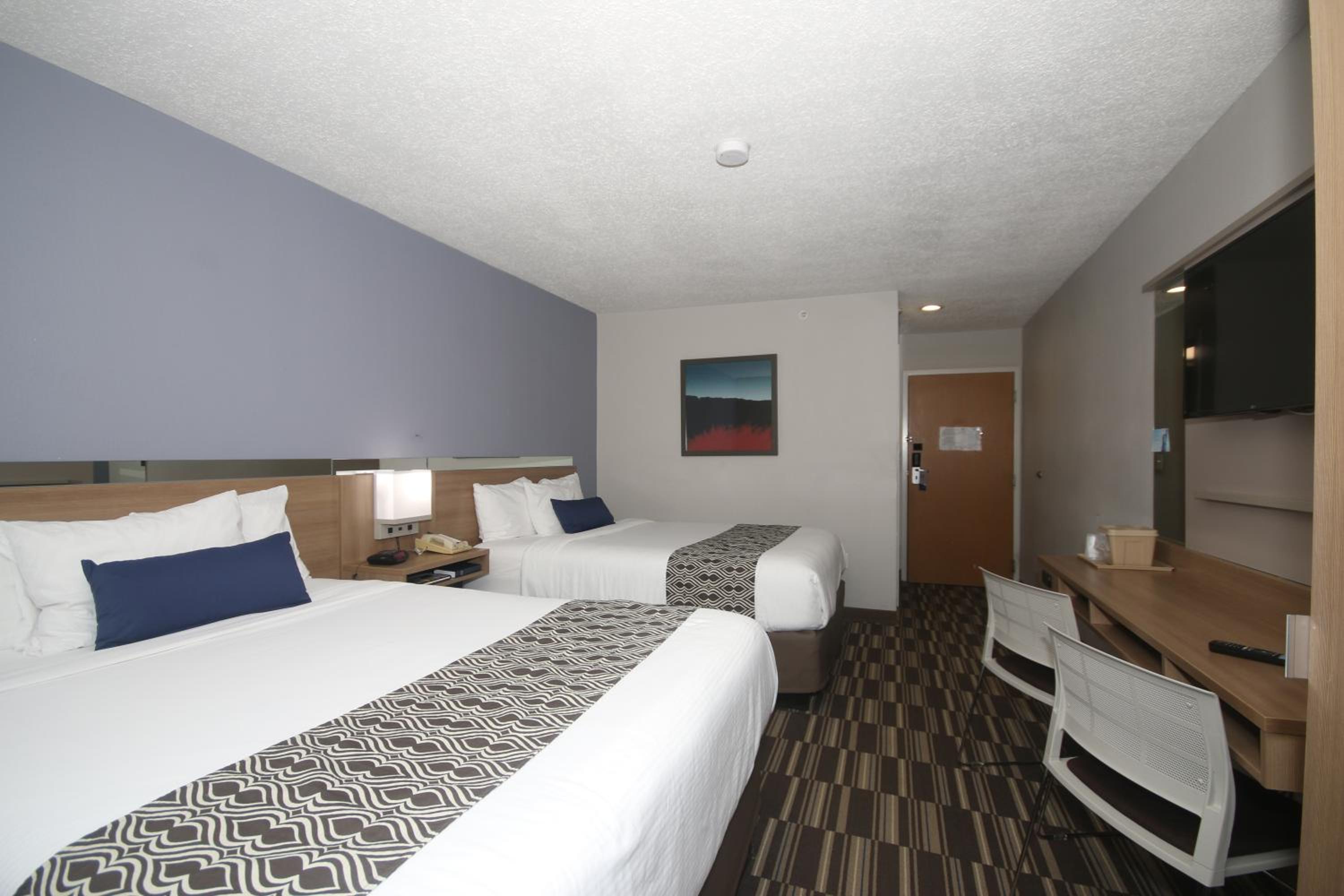 Queen Room with Two Queen Beds - Non-Smoking - Photo 1