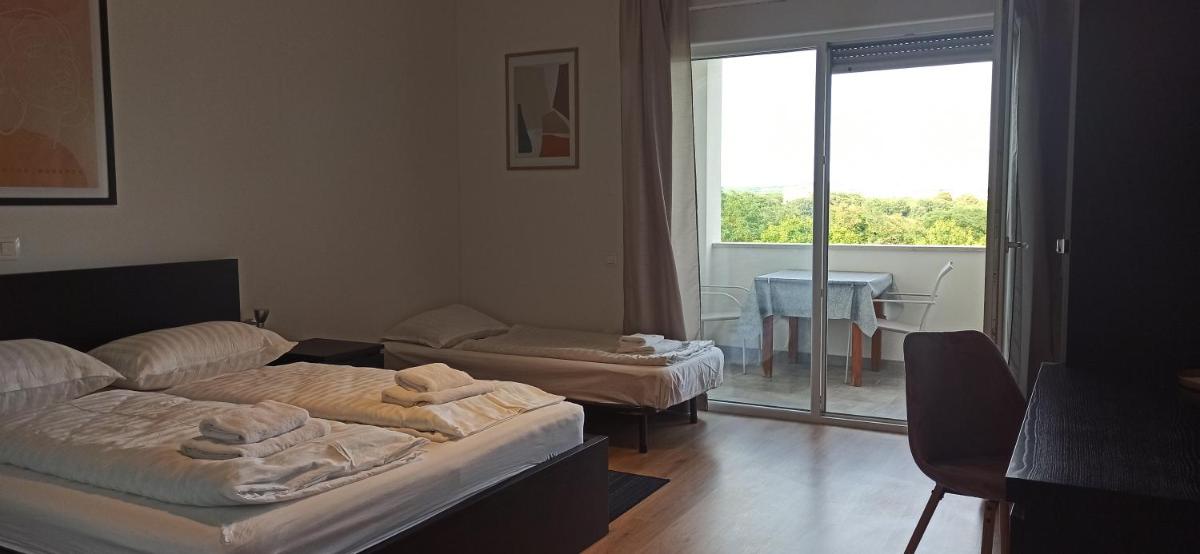 Deluxe Room - Photo 2