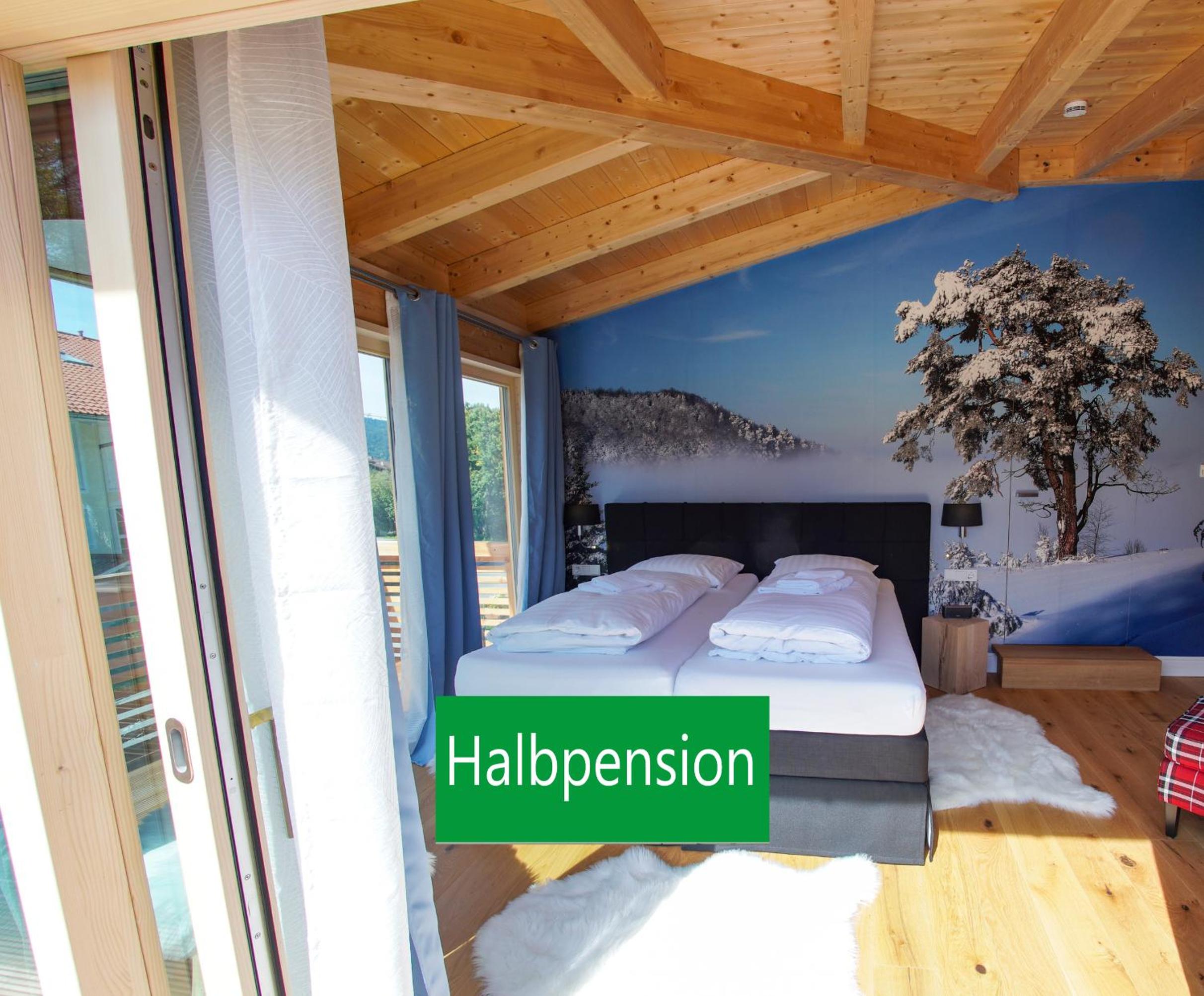 Deluxe Zimmer mit Kingsize-Bett und Balkon Deluxe Zimmer mit Kingsize-Bett und Balkon