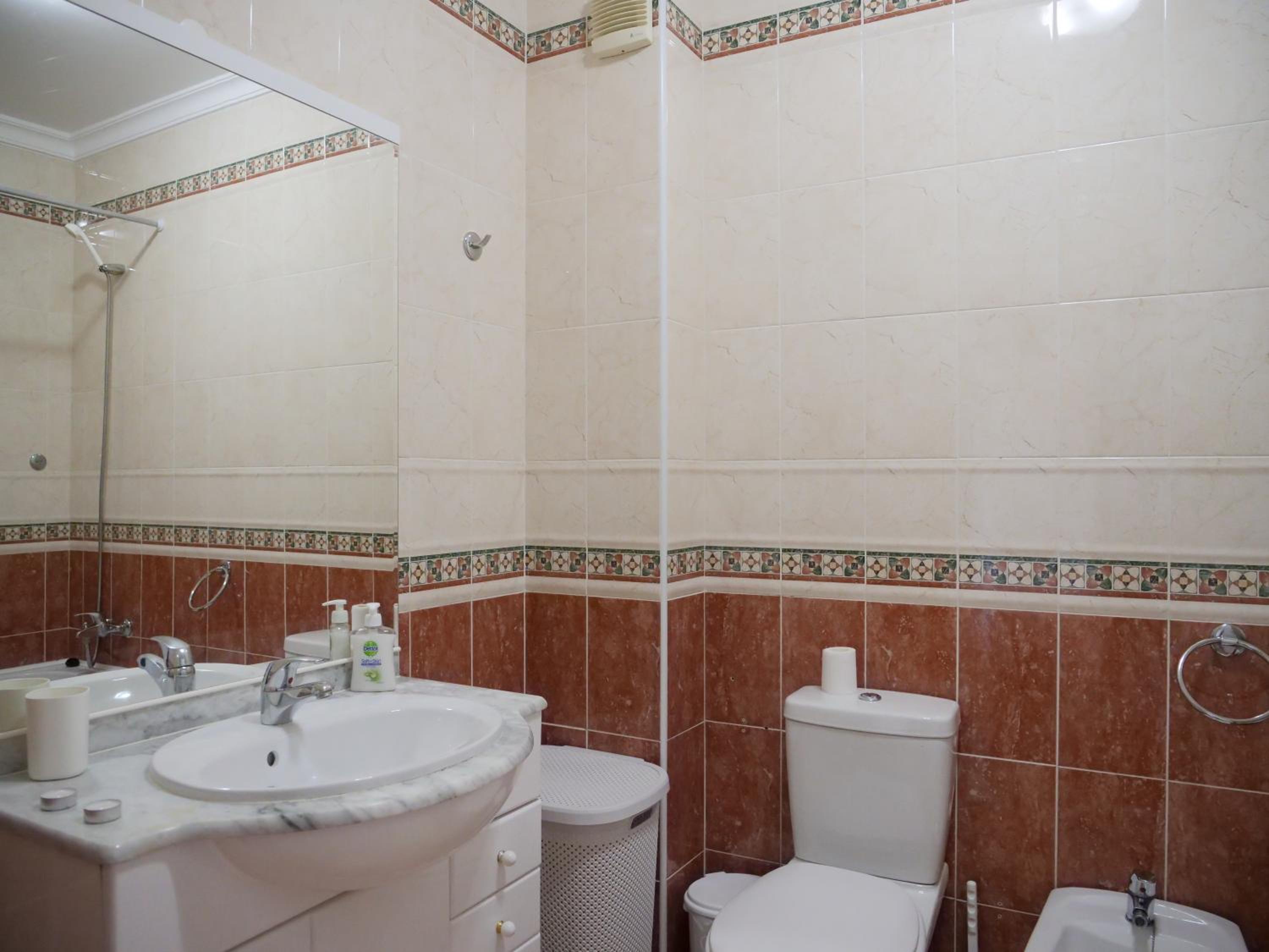 Three-Bedroom Apartment - Photo 11