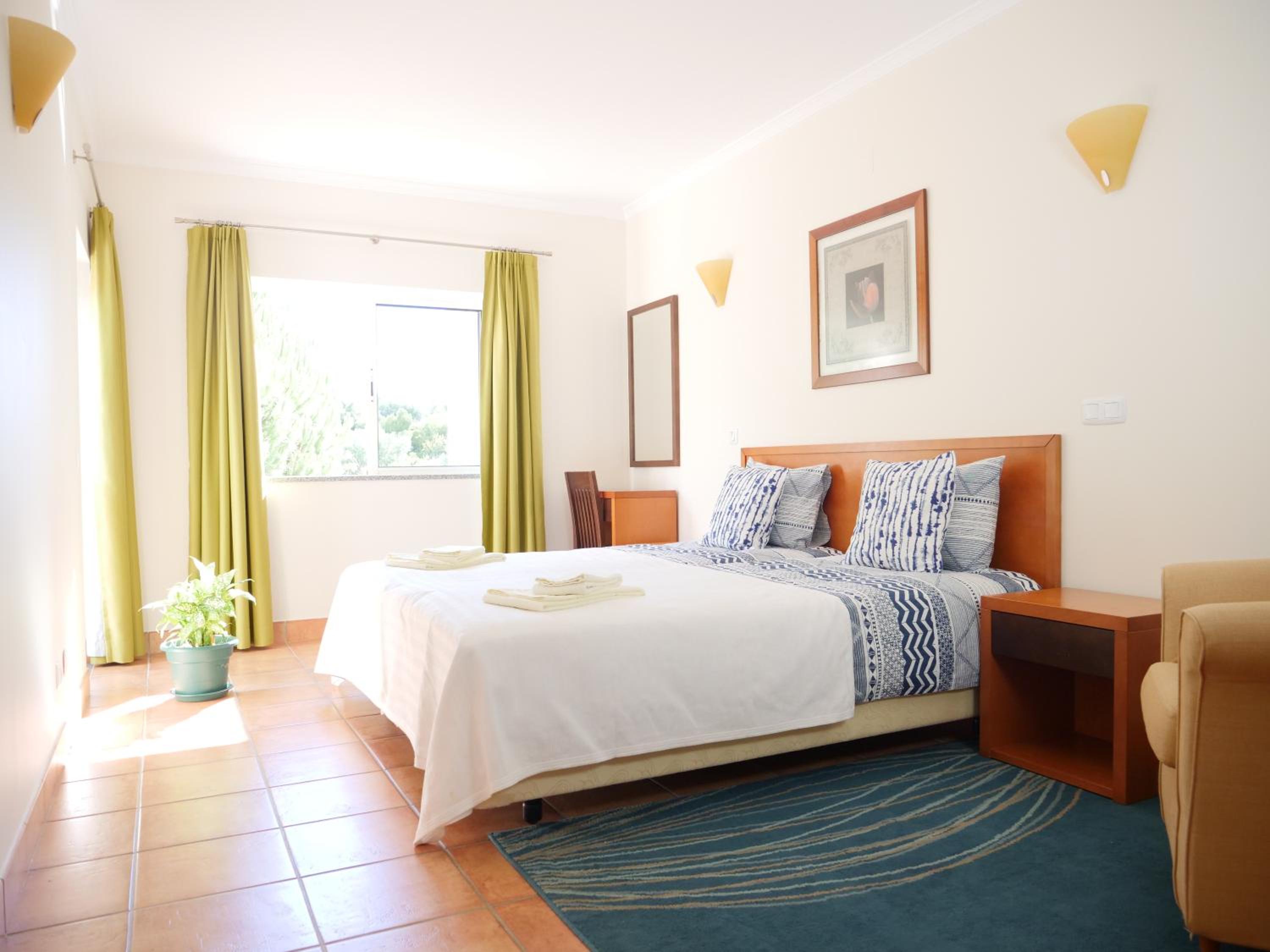 Three-Bedroom Apartment - Photo 13