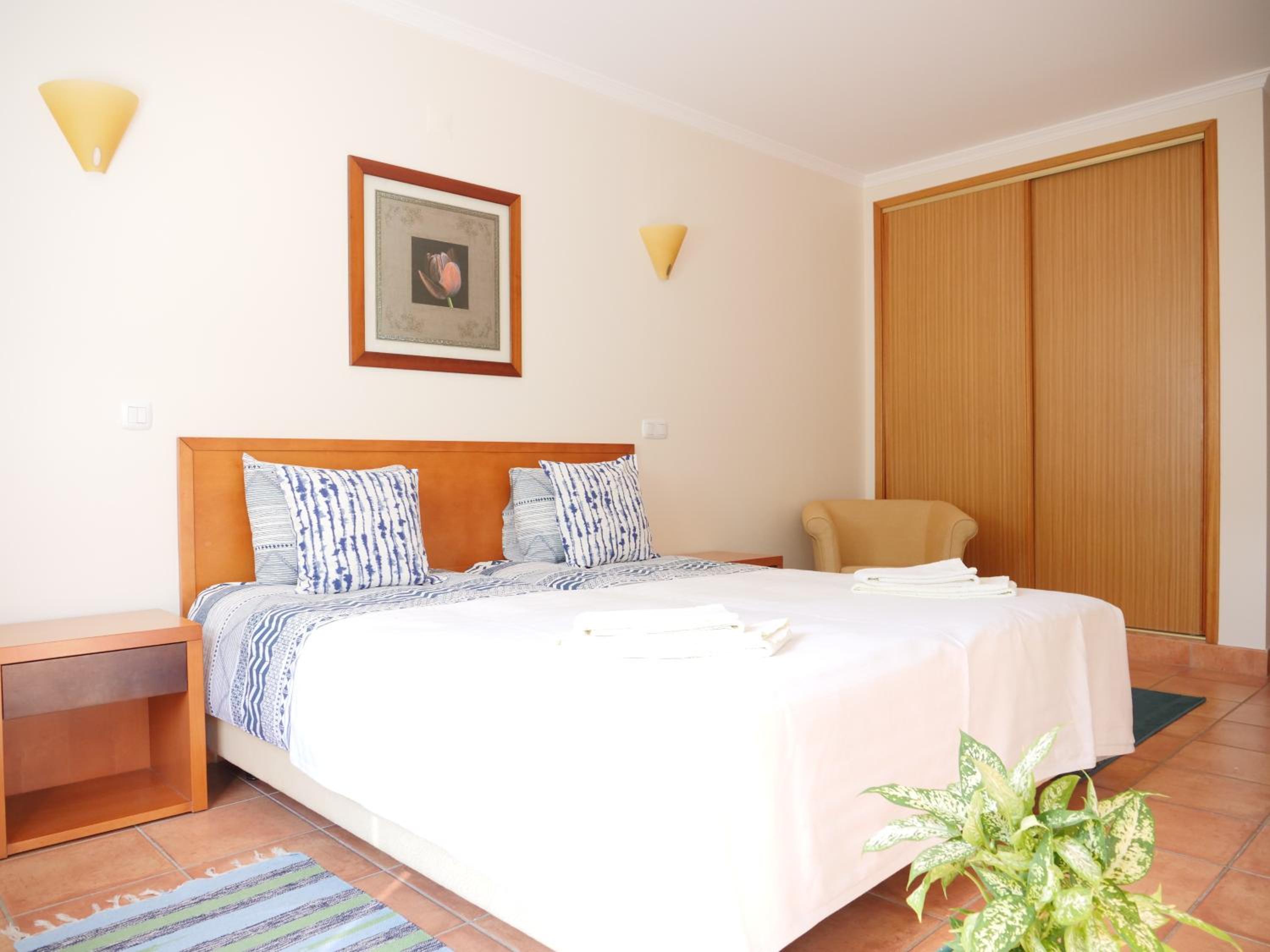 Three-Bedroom Apartment - Photo 12
