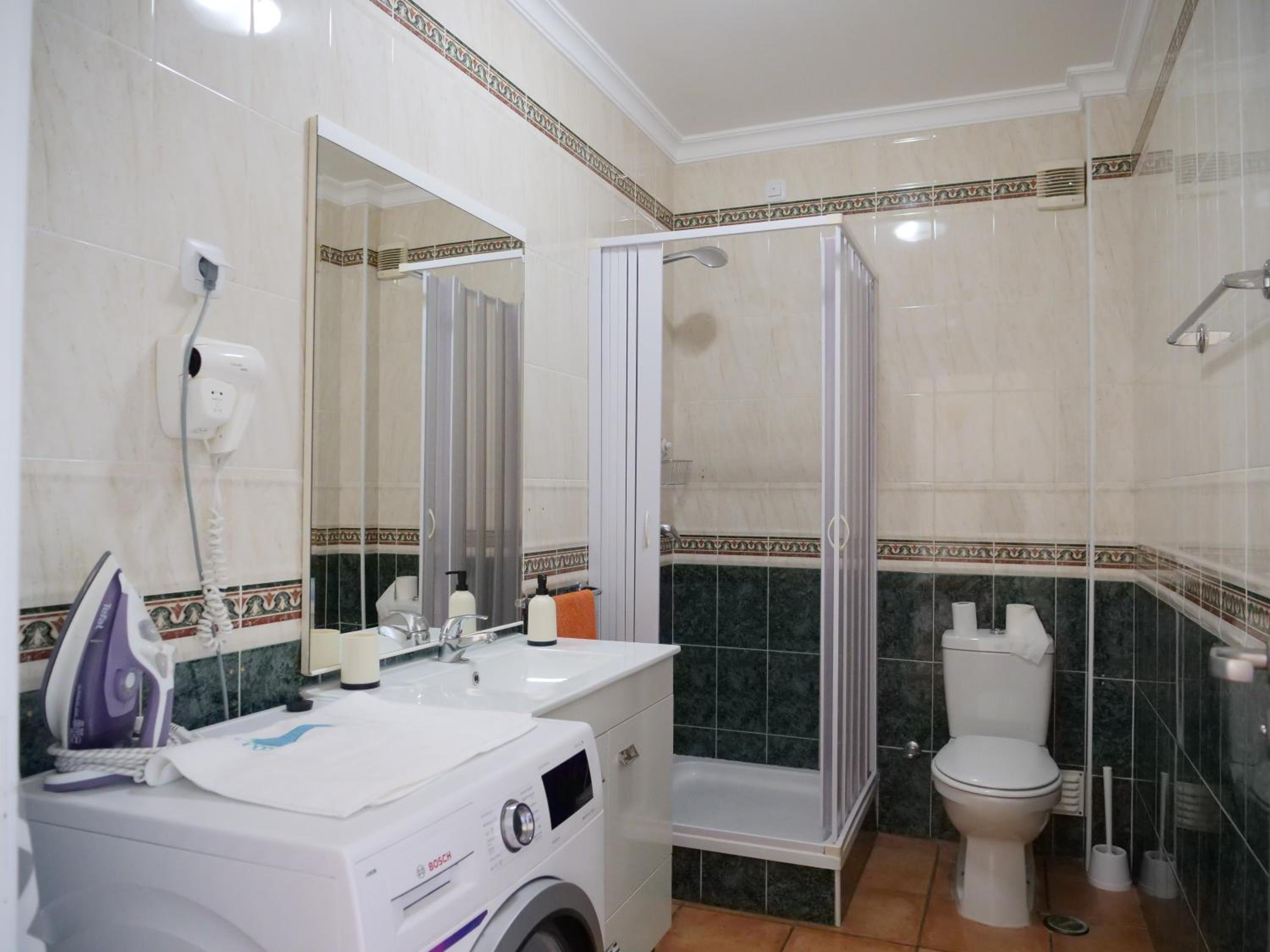 Three-Bedroom Apartment - Photo 37