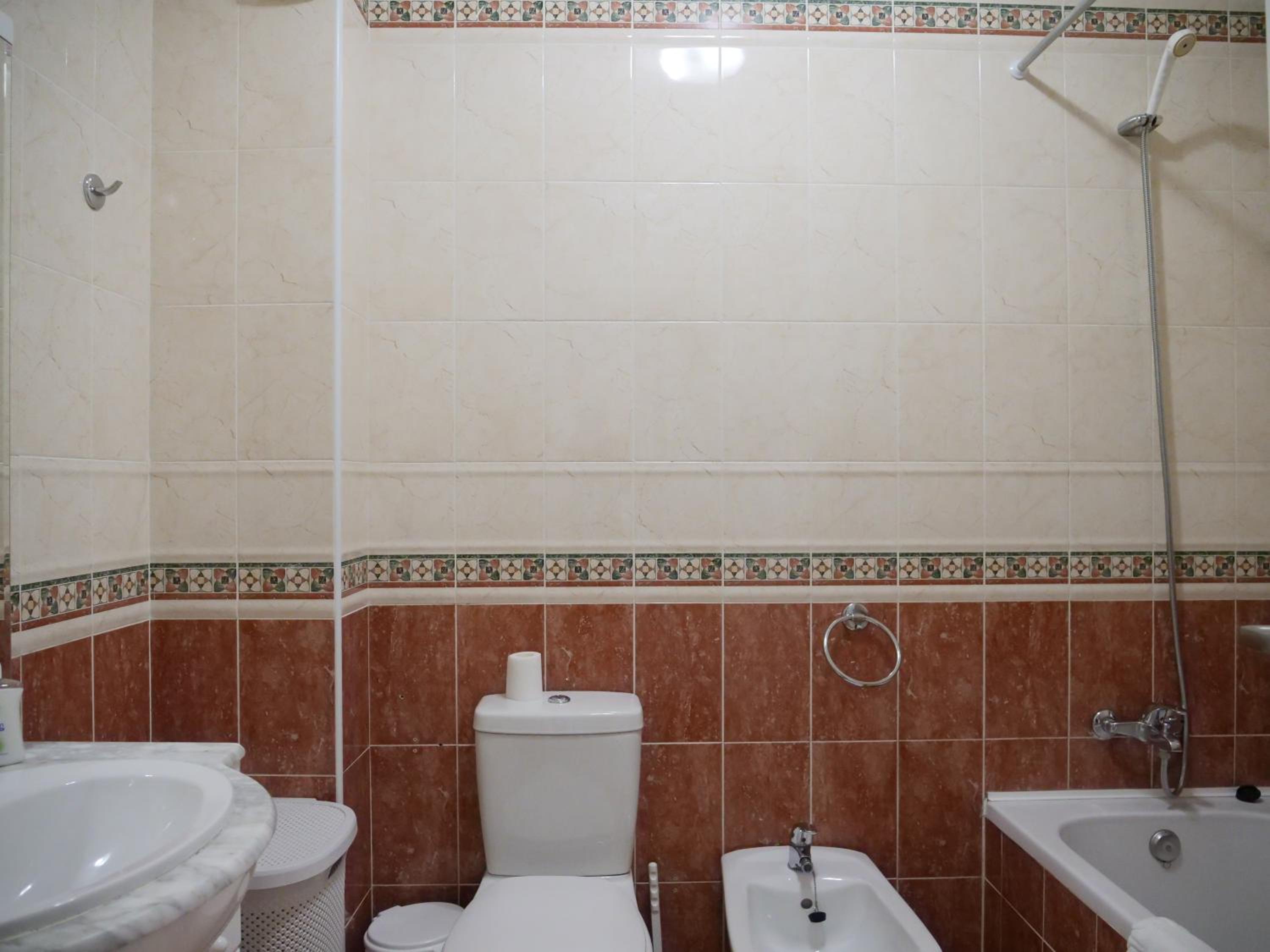 Three-Bedroom Apartment - Photo 10