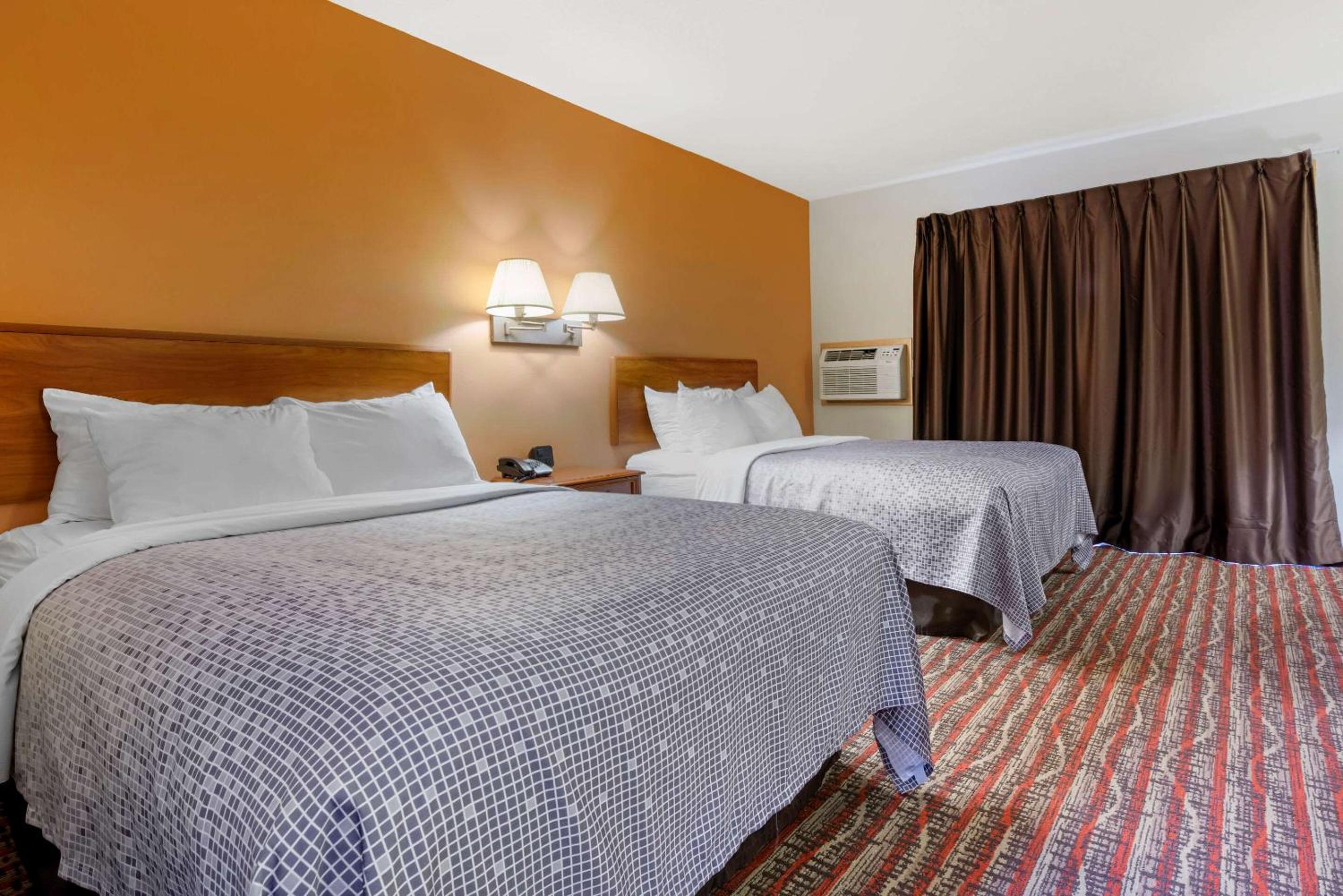 Quadruple Room with Two Double Beds and Balcony - Non-Smoking photo 1